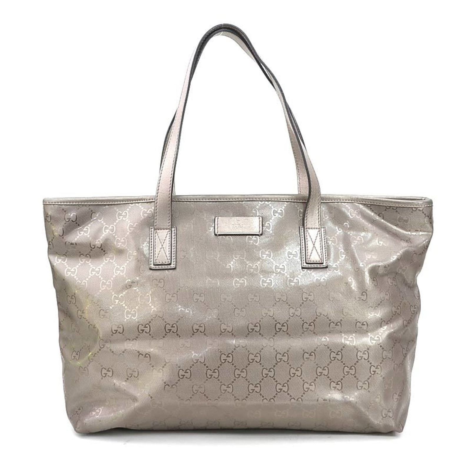 Gucci Handbag Imprim: Gucci Handbag Imprim Gucci's GG Imprim handbag boasts a striking metallic brown hue and a sleek, modern design. The bag features a zipper closure and two pockets, one with a zipper and the other