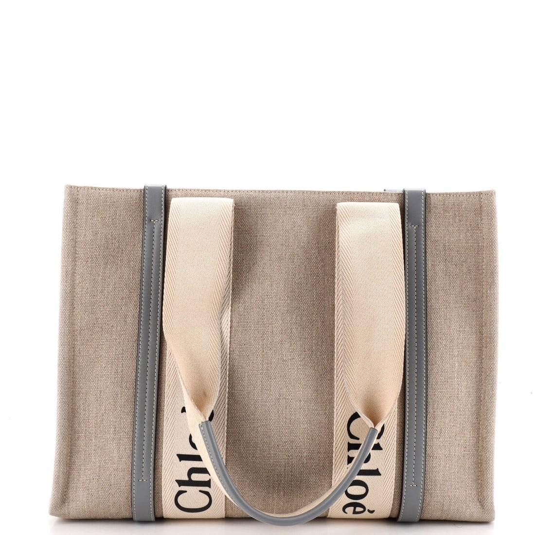Chloe Woody Tote Canvas with Leather Medium: Chloe Woody Tote Canvas with Leather Medium Canvas and leather combine in this Chloe Woody Tote, a medium-sized bag with a neutral exterior and interior. The tote features a 10.5" height and 14" width