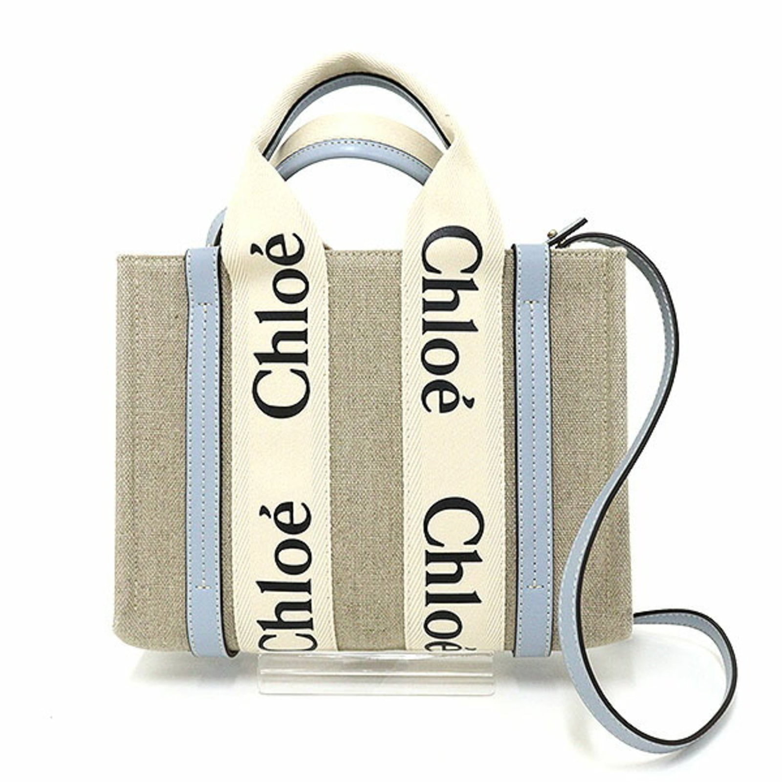 Handbag Canvas By Chlo: Handbag Canvas By Chlo Canvas by Chlo handbag in blue and white, measuring 19cm x 25cm x 8cm, comes with a dust bag for protection. This stylish canvas handbag features a classic design and a durable