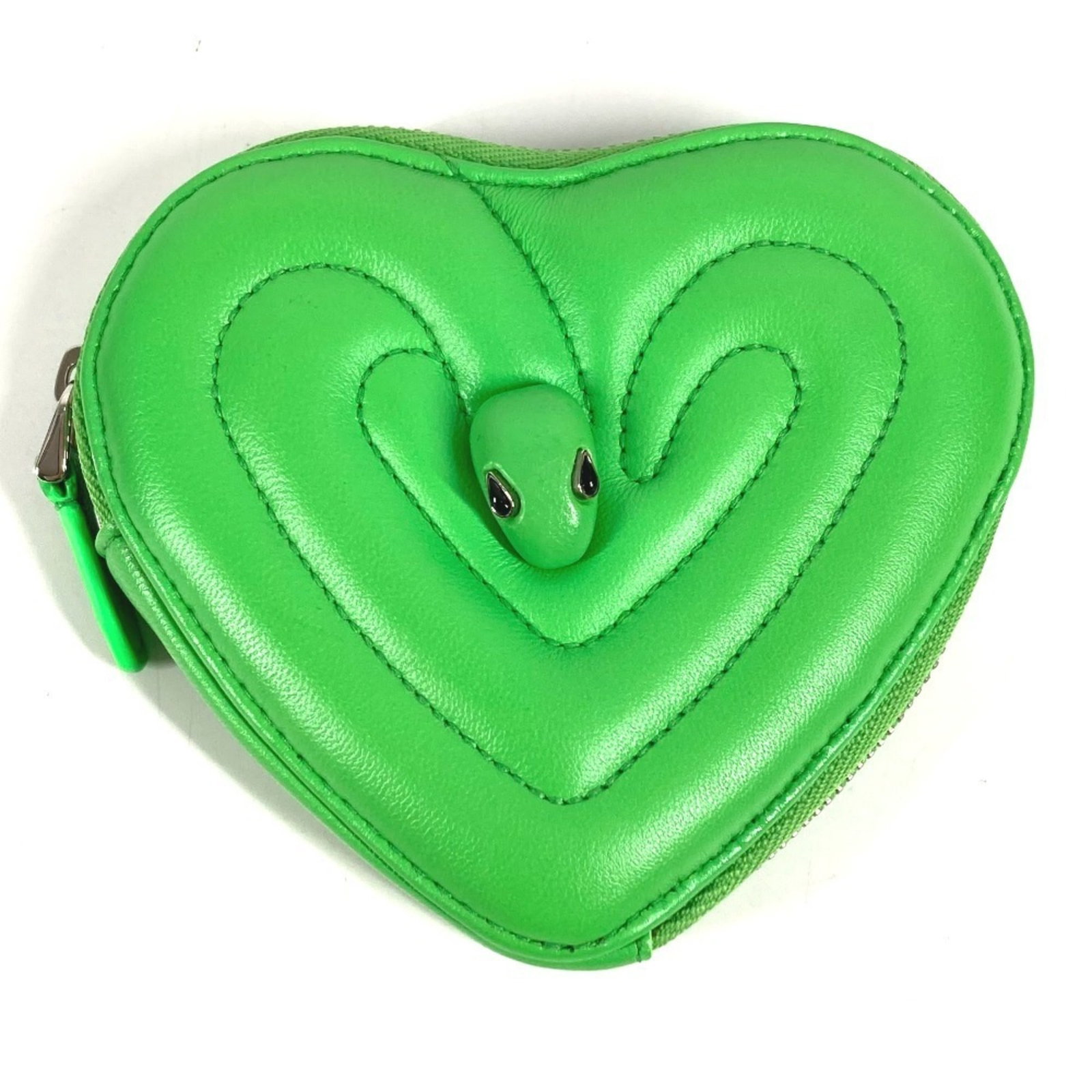 Bvlgari Coin Purse/ Coin Case Leather: Bvlgari Coin Purse/ Coin Case Leather The Bvlgari Coin Purse/ Coin Case Leather is a stylish and elegant accessory, crafted from high-quality Italian leather in a vibrant green hue. Measuring 9.5cm x