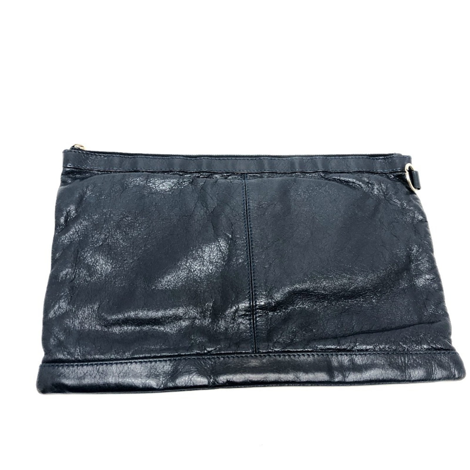 Clutch Bag Leather By Balenciaga: Clutch Bag Leather By Balenciaga Black leather clutch bag from Balenciaga, measuring 25cm x 37cm, comes with a silver hardware finish and includes a dust bag for storage. This clutch bag is made from 