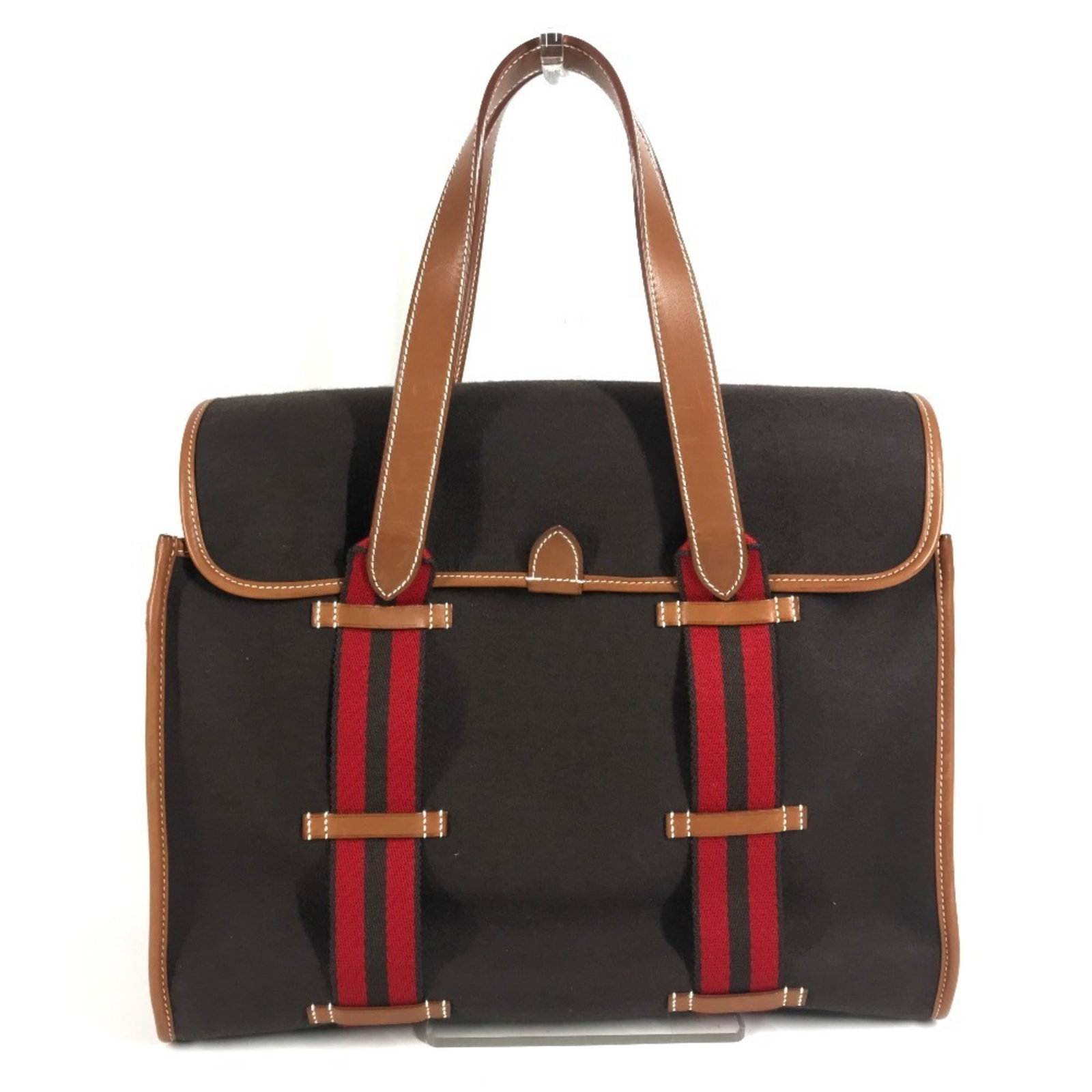 Silicone Leather Tote Handbag Hermes: Silicone Leather Tote Handbag Hermes Silicone Leather Tote Handbag in Brown and Red Colors. This unique tote bag combines the durability of silicone with the luxurious feel of leather, creating a one-