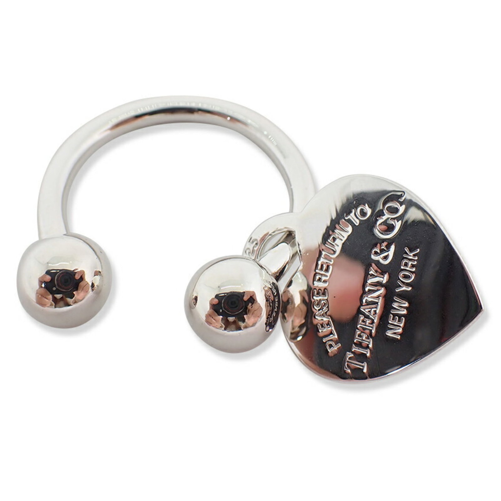 Silver Tiffany Keyring Sterling: Silver Tiffany Keyring Sterling Sterling silver Tiffany keyring bears a signature, measuring 3.4cm x 3.1cm. Made from 925 material, this charm features hearts pattern. The keyring is crafted from