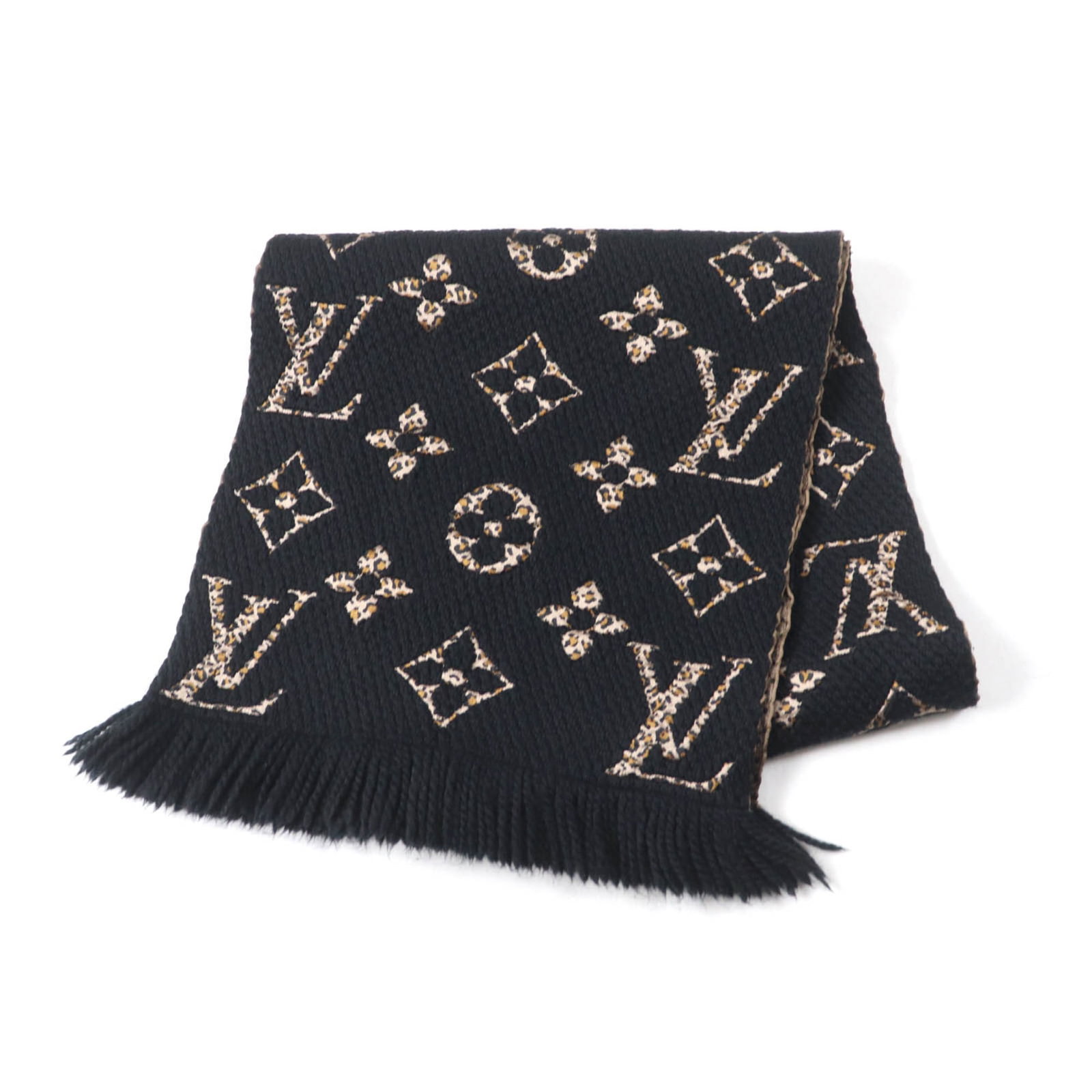 Louis Vuitton Stole Wool 74% Silk 26%: Louis Vuitton Stole Wool 74% Silk 26% Stole from Louis Vuitton, this wool and silk blend piece measures 1.55m x 38cm, bearing a serial number of gm0139. Made from 74% wool and 26% silk, its constructi