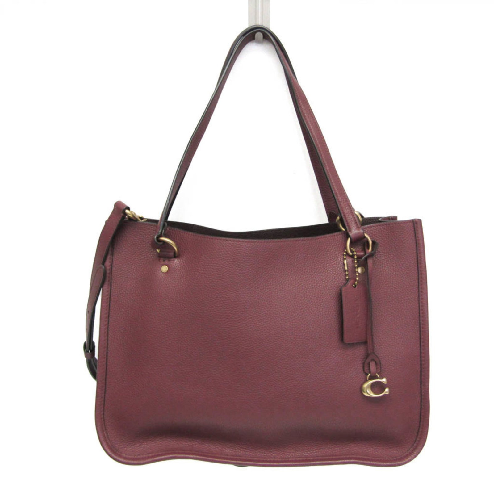 Shoulder Bag Tote Bag Leather Coach: Shoulder Bag Tote Bag Leather Coach The Coach Tyler Carryall C3768 is a stylish leather shoulder bag with a Bordeaux wine color, featuring an open zipper pocket and two open pockets for added
