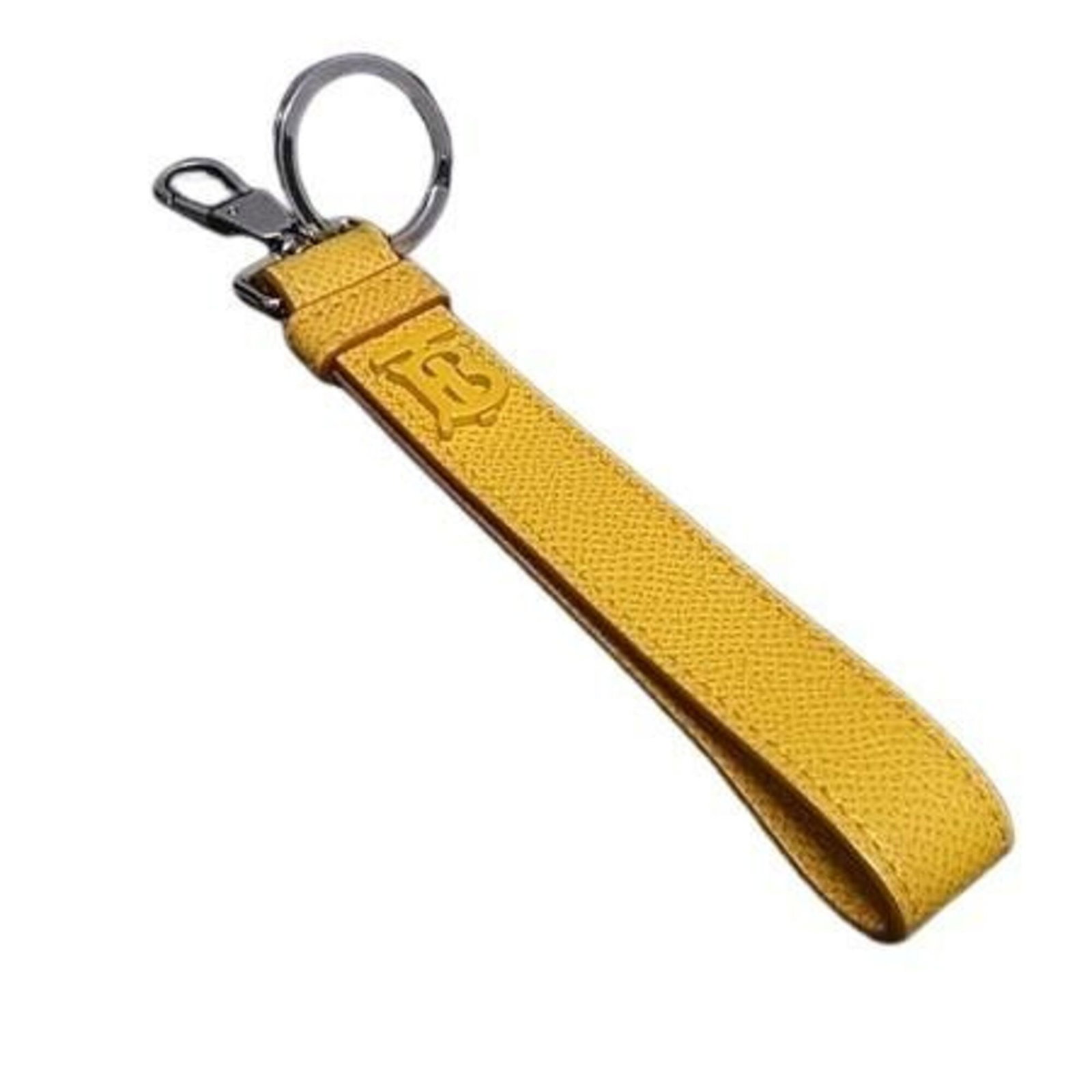 Keyring Leather Burberry: Keyring Leather Burberry Yellow leather keyring from Burberry, measuring 17.5cm x 2cm. Made from high-quality leather, this keyring is a stylish accessory. The signature is present, bearing the mark o