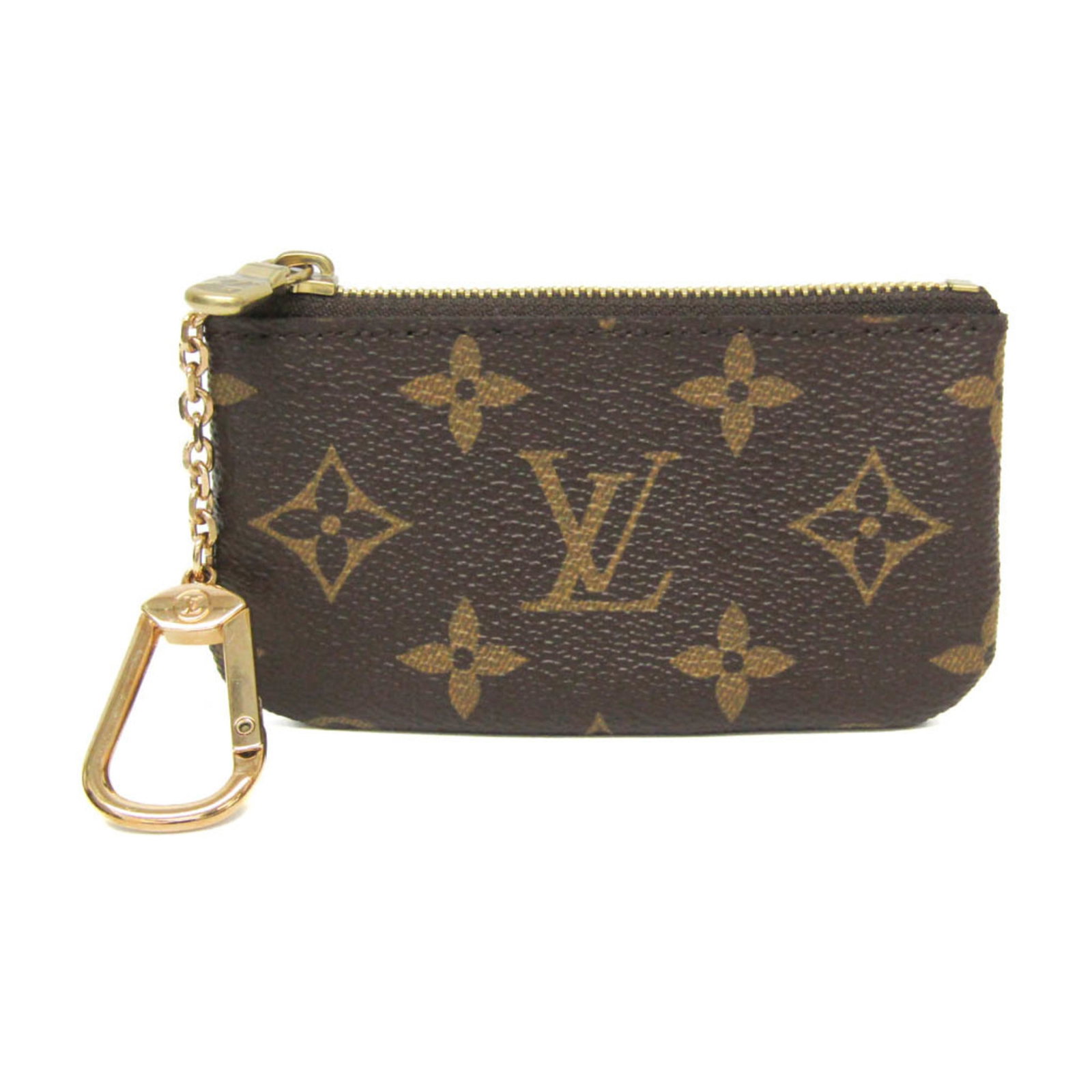 Coin purse Monogram Louis Vuitton: Coin purse Monogram Louis Vuitton The Louis Vuitton Monogram Key Pouch is a stylish and functional coin purse, featuring the iconic Monogram pattern in rich brown. With a zipper closure and adjustable