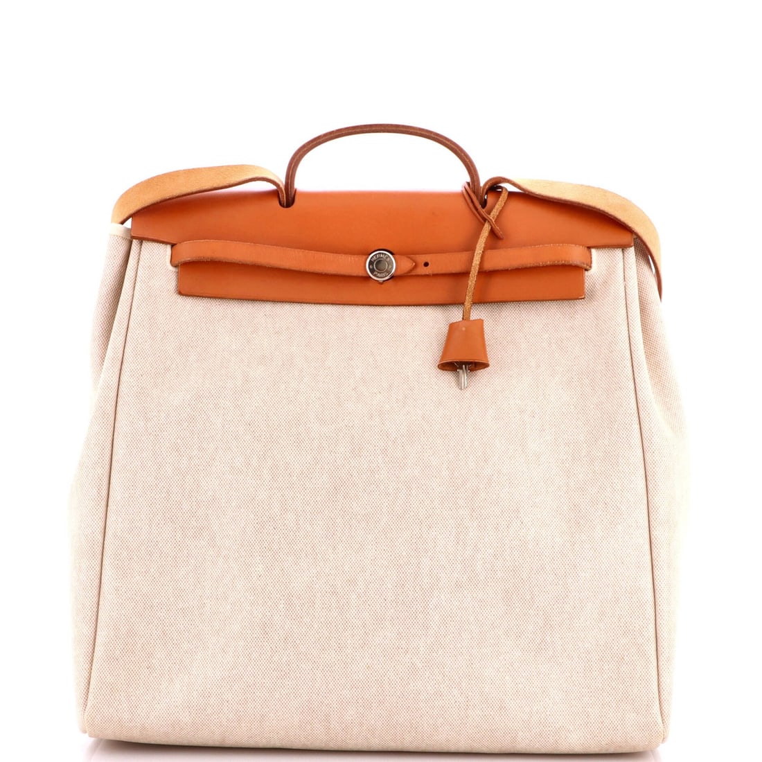 Herbag Leather Toile Hermes GM: Herbag Leather Toile Hermes GM Neutral-colored leather exterior, canvas interior, and classic top handle design make this Herbag Toile and Leather GM a timeless accessory. Minor wear and scuffs on the