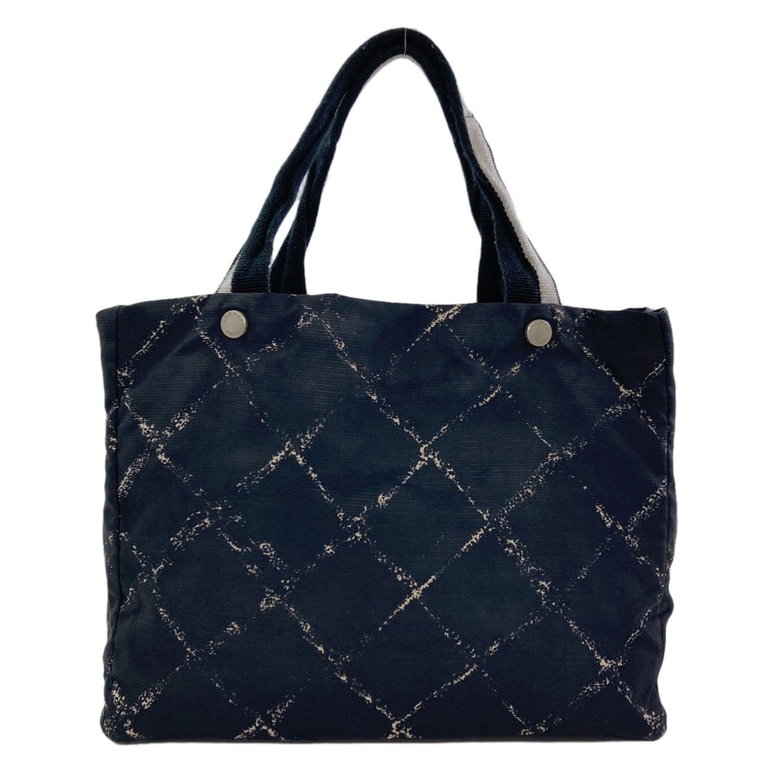Nylon Handbag Travel Line Chanel: Nylon Handbag Travel Line Chanel Black Nylon Handbag from CHANEL. This CHANEL handbag features a black exterior made of nylon. Item Specifics: Brand: CHANEL Style: Handbag Color: black Type: Handbag