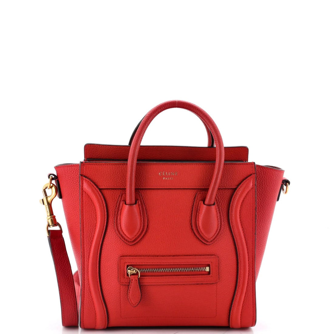 Luggage Bag Grainy Leather Nano Celine: Luggage Bag Grainy Leather Nano Celine Nano Celine Grainy Leather Cross Body Bag in Red features a unique grainy leather exterior with a sleek, compact design. The bag measures 8" tall, 7.5" wide, and