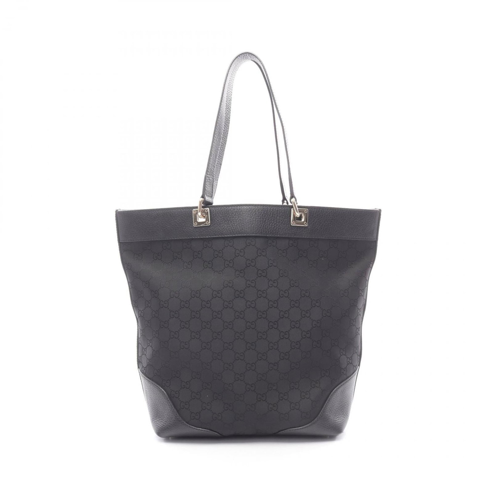 Handbag Gucci Nylon Leather Tote: Handbag Gucci Nylon Leather Tote Gucci Nylon Leather Tote in Black. This versatile tote features a striking combination of nylon and leather materials, with a durable nylon exterior and a rich leather