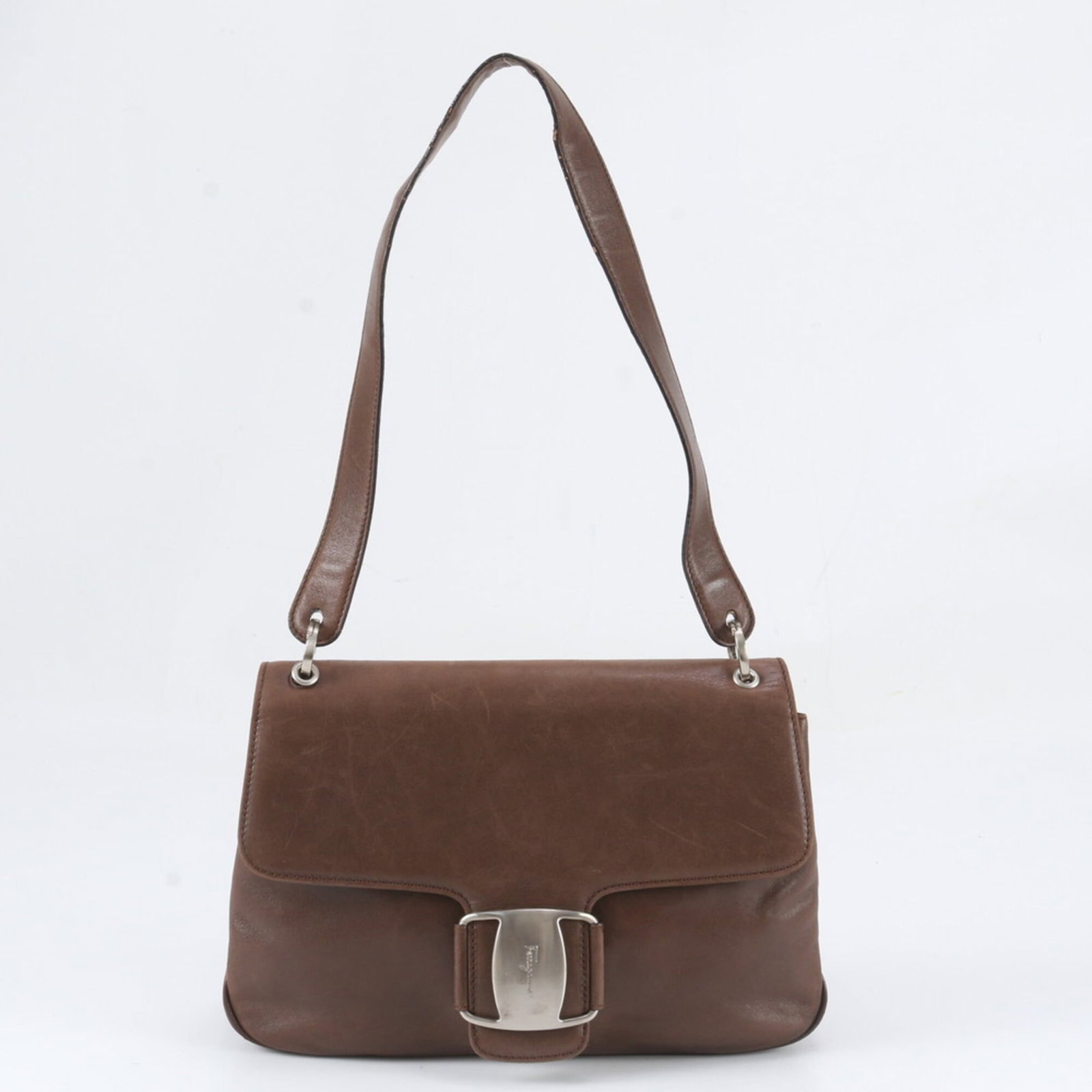 Ferragamo Leather Shoulder Bag: Ferragamo Leather Shoulder Bag Brown Leather Shoulder Bag from Salvatore Ferragamo, Italy. Made from high-quality leather, this shoulder bag features a classic design with a 17cm x 27cm x 8cm size,