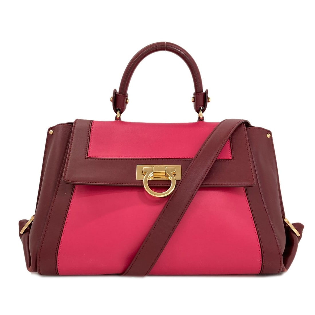 Salvatore Ferragamo Sophia Gancini Handbag Leather: Salvatore Ferragamo Sophia Gancini Handbag Leather Pink leather handbag from Salvatore Ferragamo's Sophia Gancini style, featuring a bold pink exterior. This elegant bag showcases the brand's
