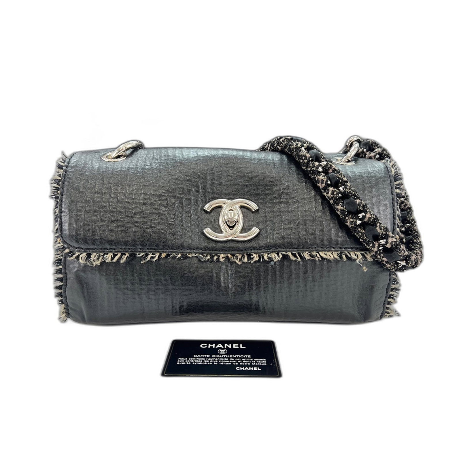 Shoulder Bag by Chanel: Shoulder Bag by Chanel Black Chanel shoulder bag with a sleek 14cm x 29cm x 11cm size and 52cm strap length. This stylish bag features a classic design with a bold black color. Item Specifics: Brand: