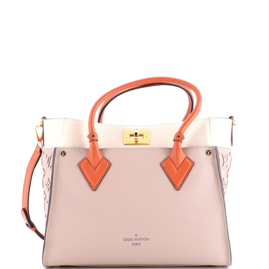Tote Side My Leather Monogram Vuitton Tuffetage: Tote Side My Leather Monogram Vuitton Tuffetage Tote Side My Leather Monogram Vuitton Tuffetage is a neutral-colored, MM-sized tote with a gold hardware and a signature. The exterior features minor cr