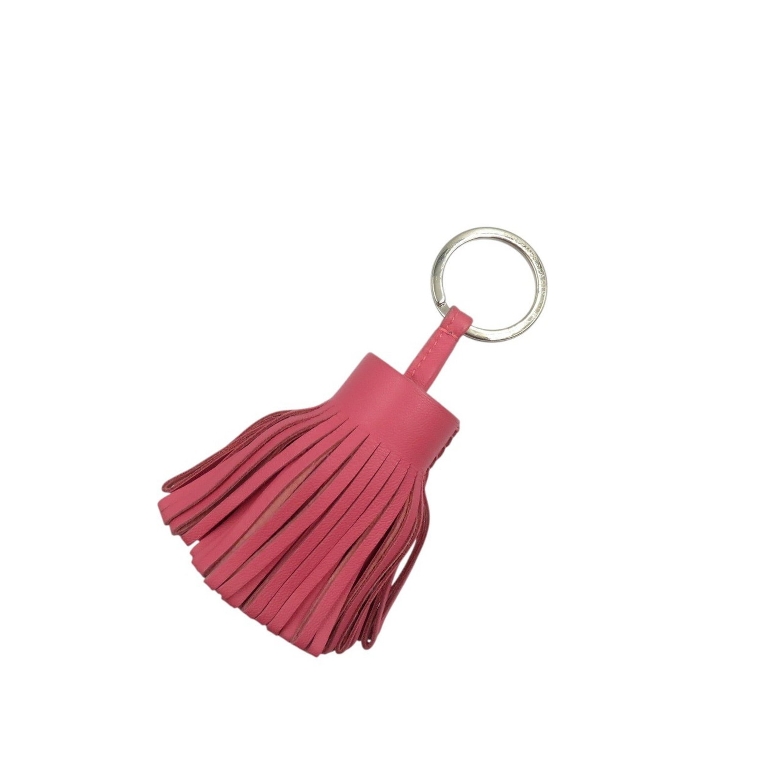 Keyring Agneau Milo Hermes: Keyring Agneau Milo Hermes Agneau Milo is a high-quality material used in the creation of this keyring, originating from France. The keyring features a distinctive pink and silver design, measuring 12