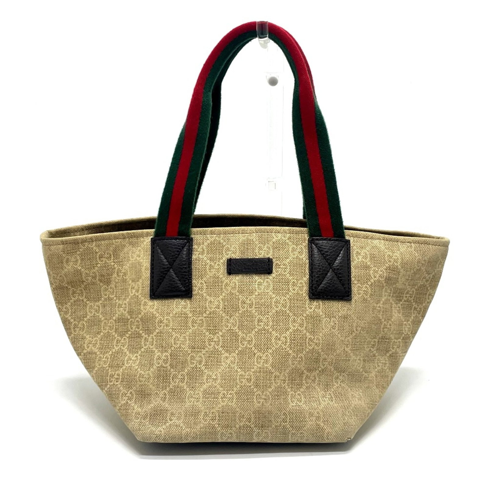 Tote Bag Gucci: Tote Bag Gucci Gucci's iconic tote bag boasts a timeless beige color and sturdy design, measuring 17.5cm x 20cm x 20cm in dimensions. The bag features a 17.3inch handle, providing a comfortable