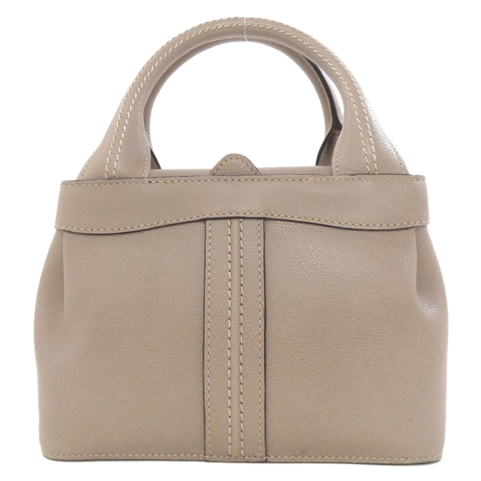 Handbag Leather Valextra: Handbag Leather Valextra This beige leather handbag from Valextra features a classic design with a 26cm long handle, making it a practical and stylish accessory. The bag measures 14.5cm x 21cm x