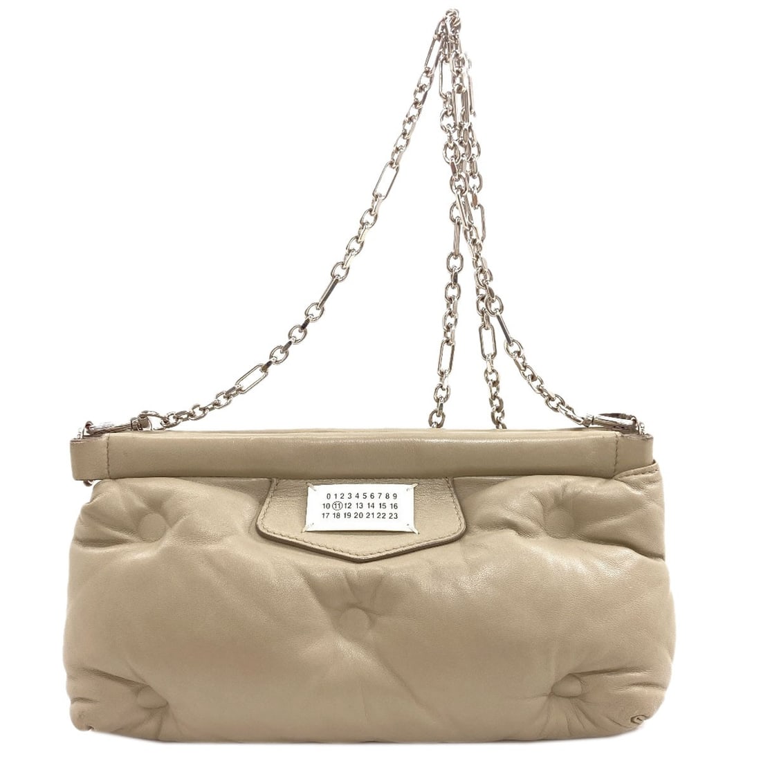 Calf Gram Slam Red Carpet Shoulder Bag Maisonmargiela: Calf Gram Slam Red Carpet Shoulder Bag Maisonmargiela Calf Gram Slam Red Carpet Shoulder Bag Maisonmargiela is a stylish shoulder bag with a gray calf exterior, measuring 6.3 inches in height and 2.4