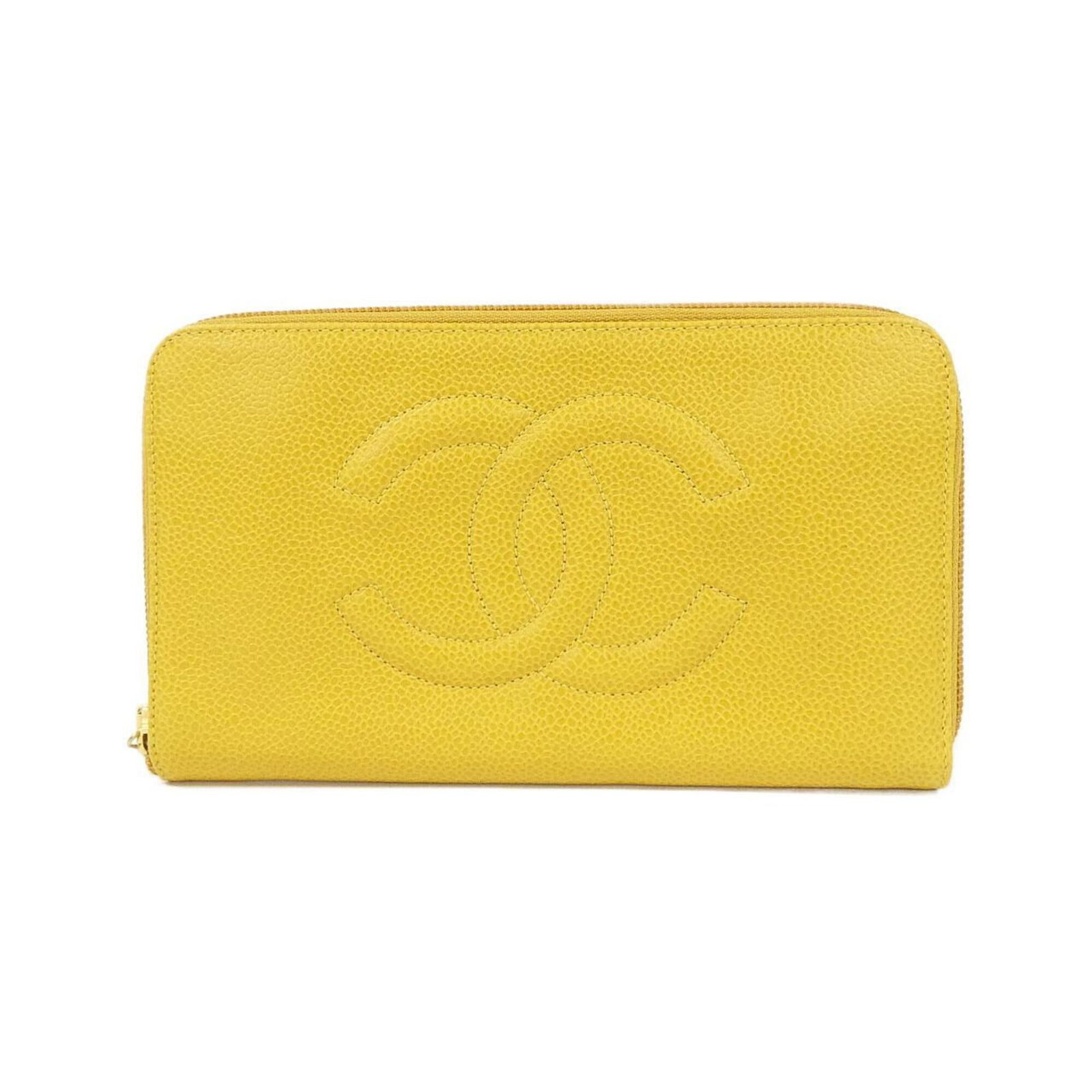 Chanel Long Wallet (Bi-Fold) Grained Calfskin: Chanel Long Wallet (Bi-Fold) Grained Calfskin The Chanel Long Wallet (Bi-Fold) Grained Calfskin boasts a striking yellow hue, adding a pop of color to any purse or handbag collection. Made from
