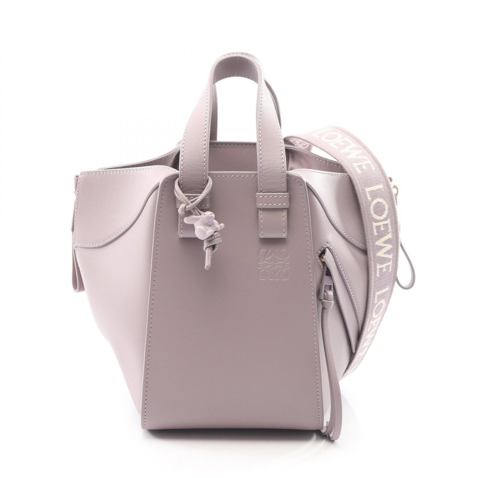 Handbag Leather Handbag: Handbag Leather Handbag The Loewe handbag is a stylish purple leather bag, measuring 20cm x 14cm x 19cm. Made from high-quality leather, this bag features a distinctive design that showcases its
