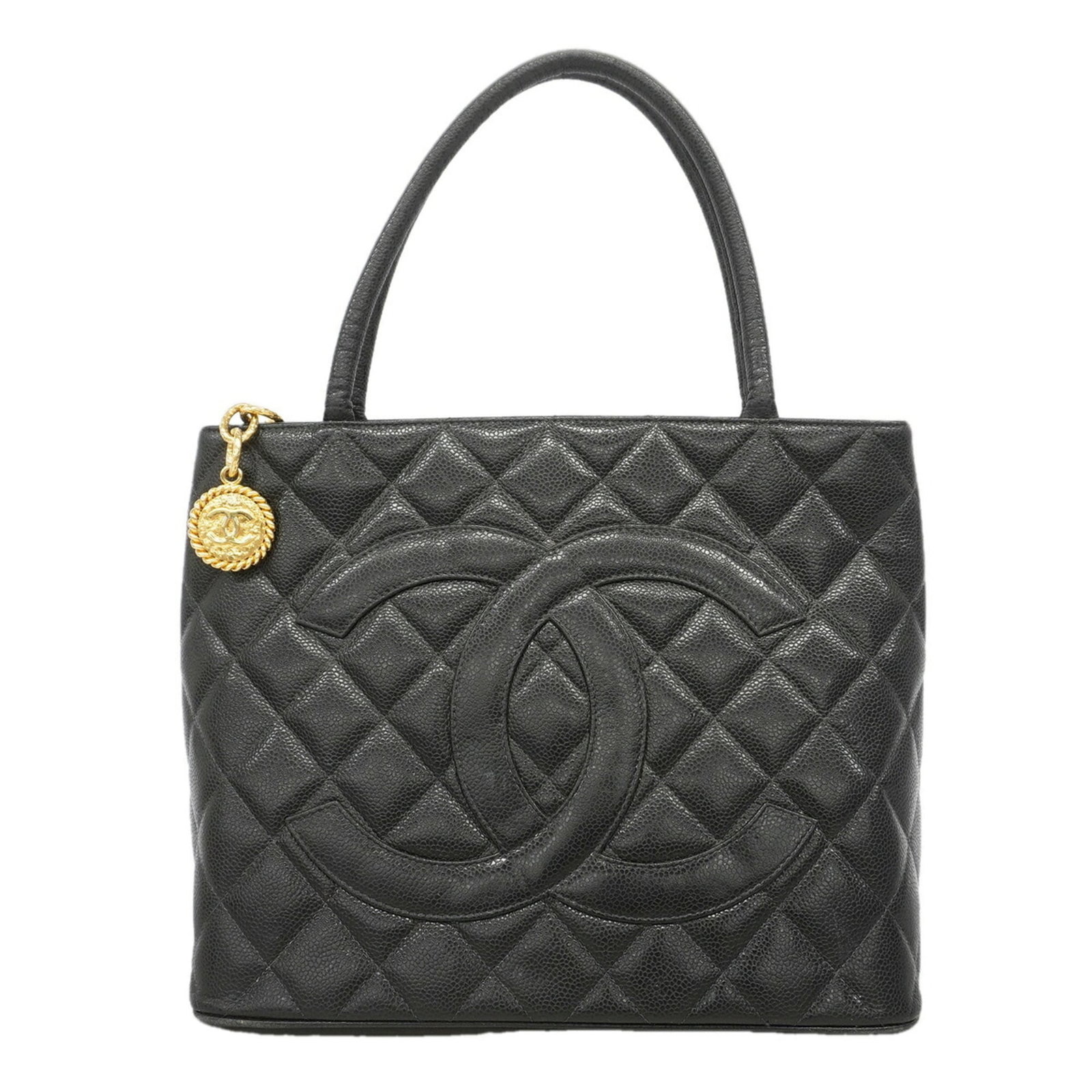 Calfskin Tote Bag Chanel: Calfskin Tote Bag Chanel Grained Calfskin Tote Bag in Black with Gold Hardware. This Chanel tote bag boasts a sleek, all-black design with gold accents, crafted from high-quality grained calfskin. Its