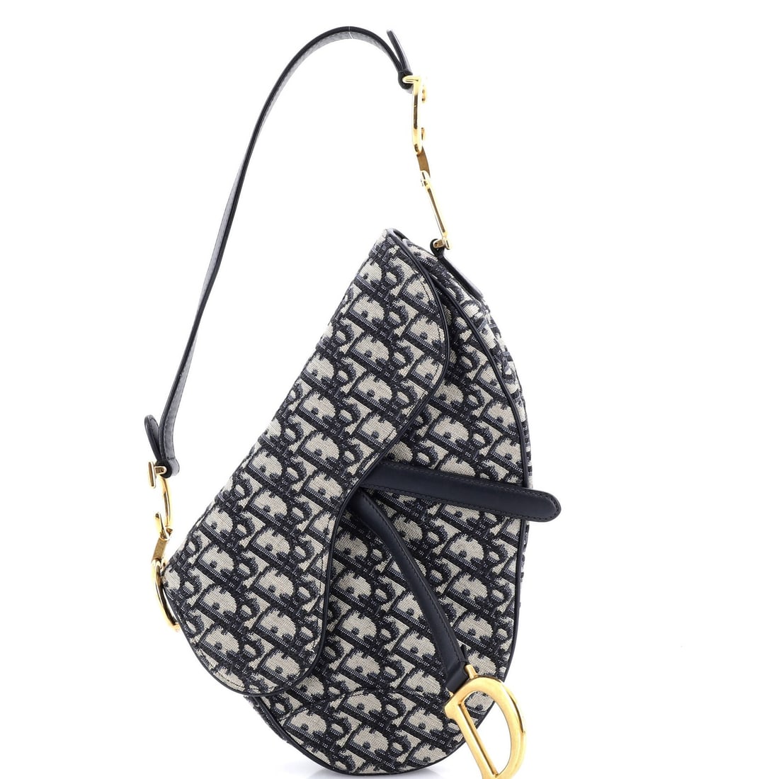 Canvas Oblique Medium Saddle Handbag Dior Christian: Canvas Oblique Medium Saddle Handbag Dior Christian Canvas Oblique Medium Saddle Handbag Dior. This Dior Saddle Handbag features a striking blue canvas exterior with an oblique design, adding a touch
