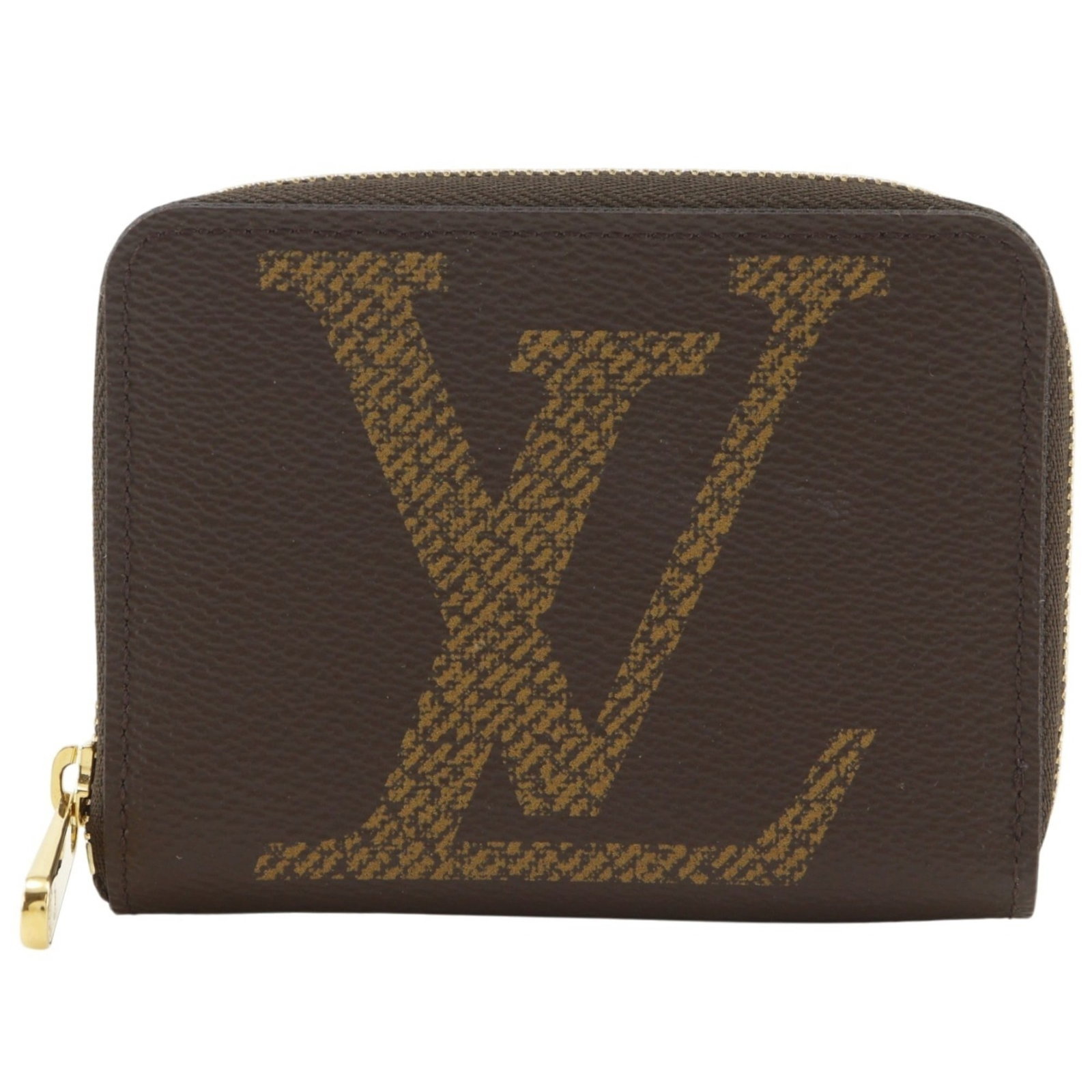 Coin purse Monogram Louis Vuitton: Coin purse Monogram Louis Vuitton Monogrammed with iconic Louis Vuitton design, this brown coin purse features a classic M69354 style. Made from high-quality materials, it measures 8.5cm x 11cm x 2cm