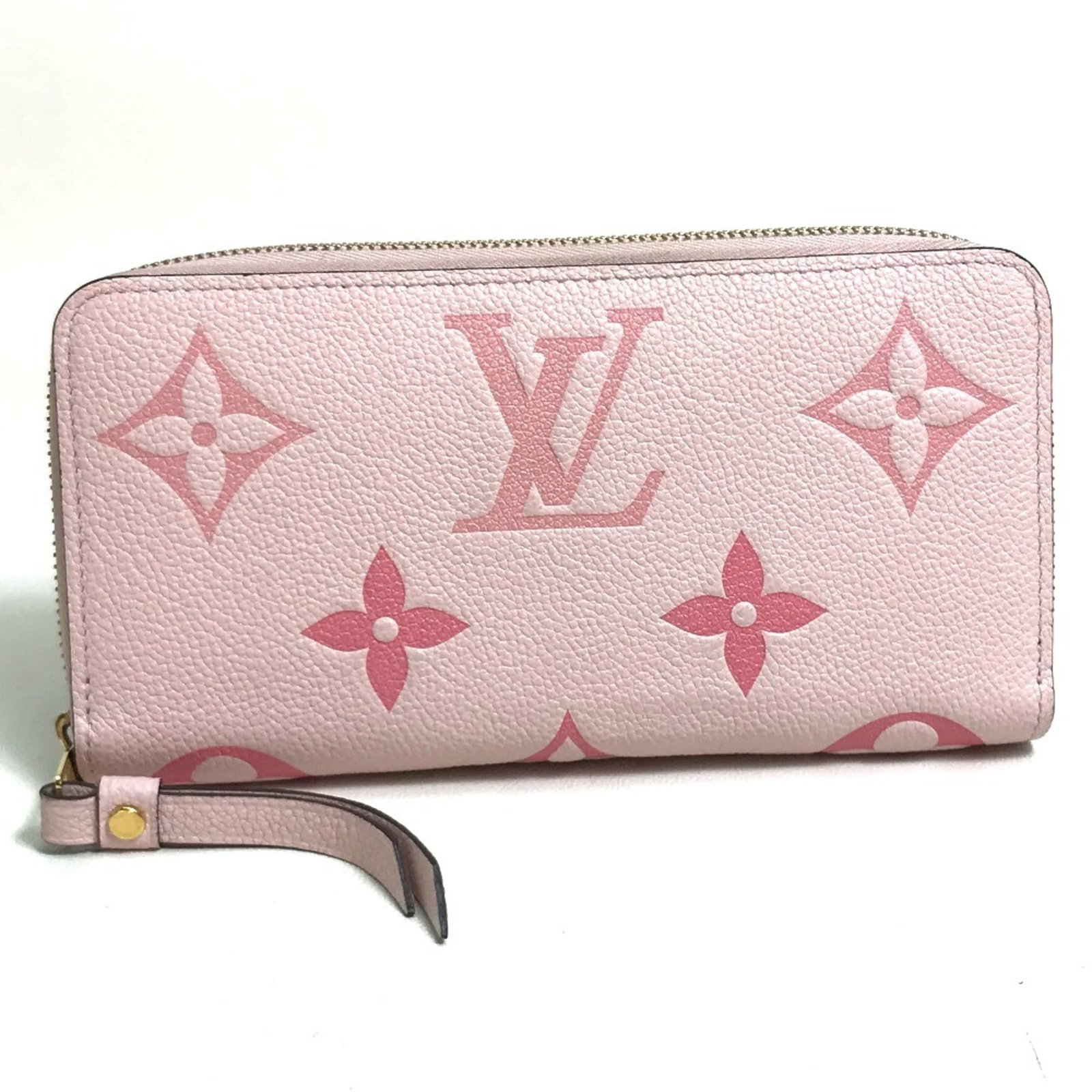Bi Fold Monogram Empreinte Wallet Louis Vuitton: Bi Fold Monogram Empreinte Wallet Louis Vuitton Monogram Empreinte wallet in pink, featuring a bi-fold design with a zipper closure, coin purse, and 12 card slots. This stylish wallet measures 10cm x