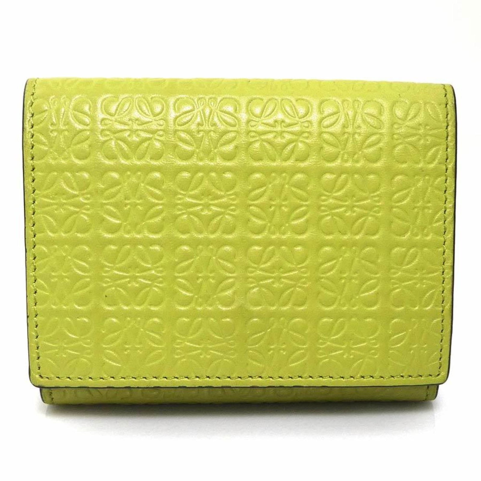 Loewe Wallet (Tri-Fold) Leather: Loewe Wallet (Tri-Fold) Leather The Loewe Wallet is a tri-fold leather wallet with a rich green and yellow color scheme. Measuring 8cm x 10.3cm x 3cm, it features a classic design with clean lines