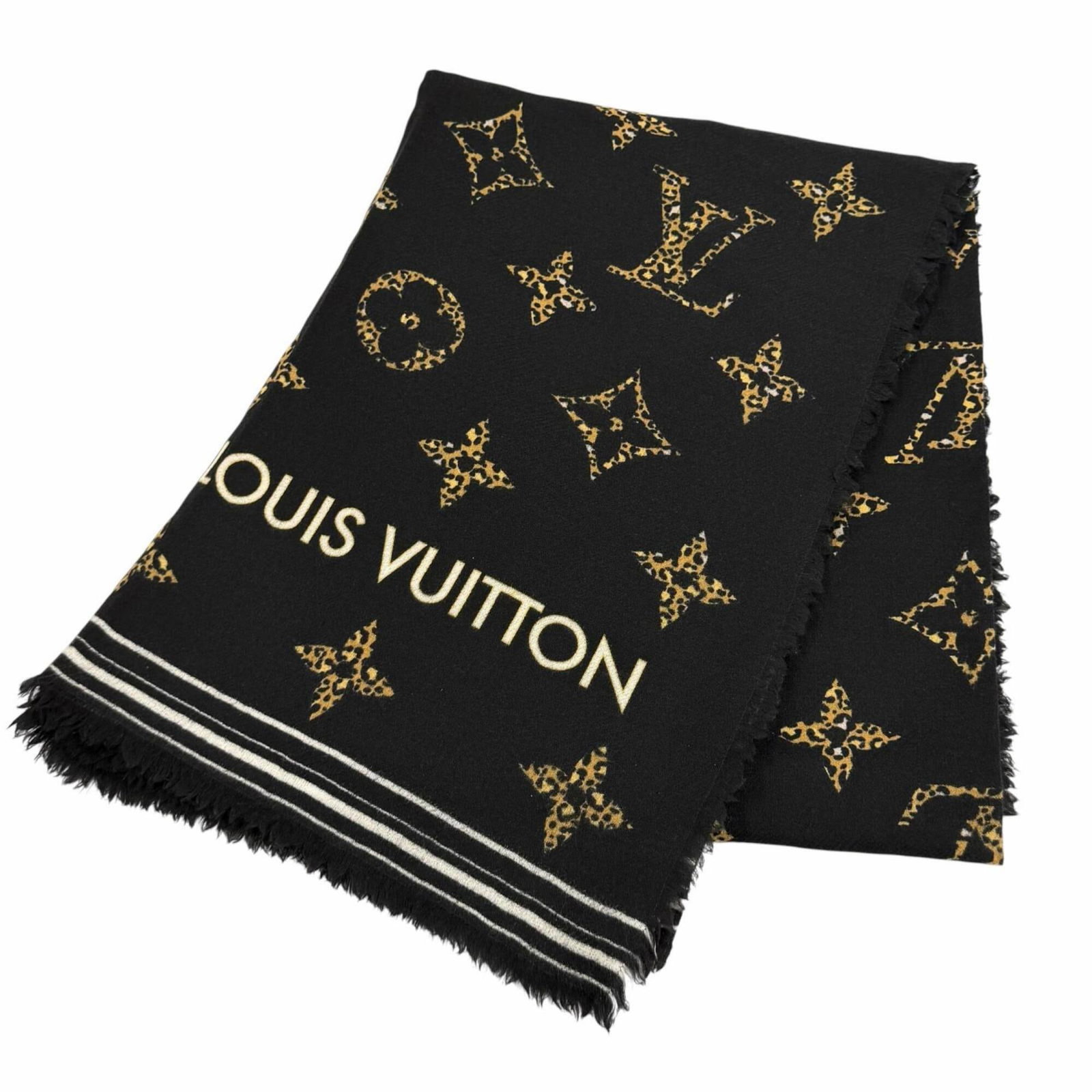 Louis Vuitton Stole Wool: Louis Vuitton Stole Wool Louis Vuitton Stole Wool is a black wool stole measuring 1.78m x 64cm, made from the iconic Italian brand. The stole bears a signature and is crafted from high-quality wool ma