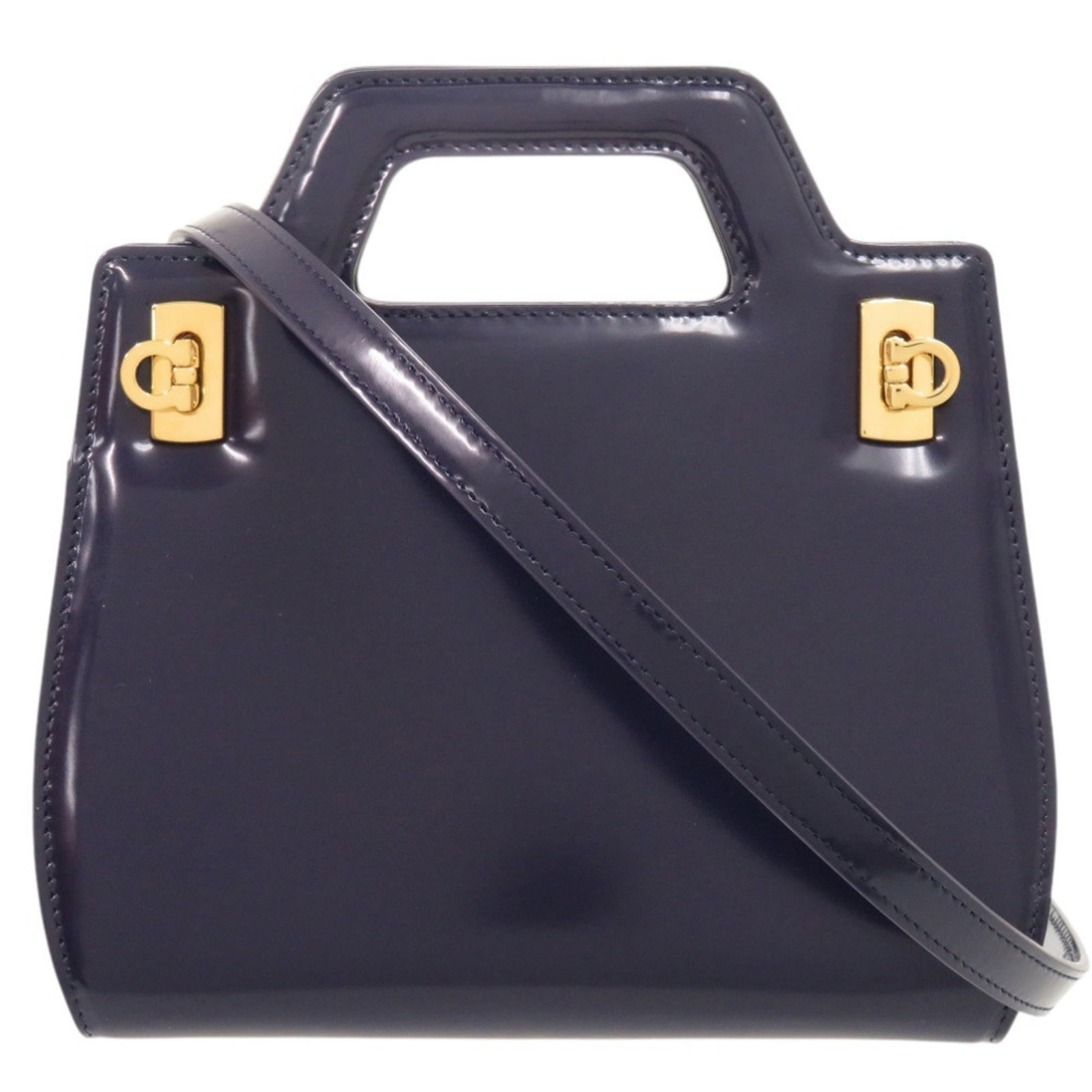 Salvatore Ferragamo Handbag Leather: Salvatore Ferragamo Handbag Leather Salvatore Ferragamo Handbag Leather is a stunning blue calfskin handbag from Italy. This beautiful piece boasts a classic design with a timeless blue color that