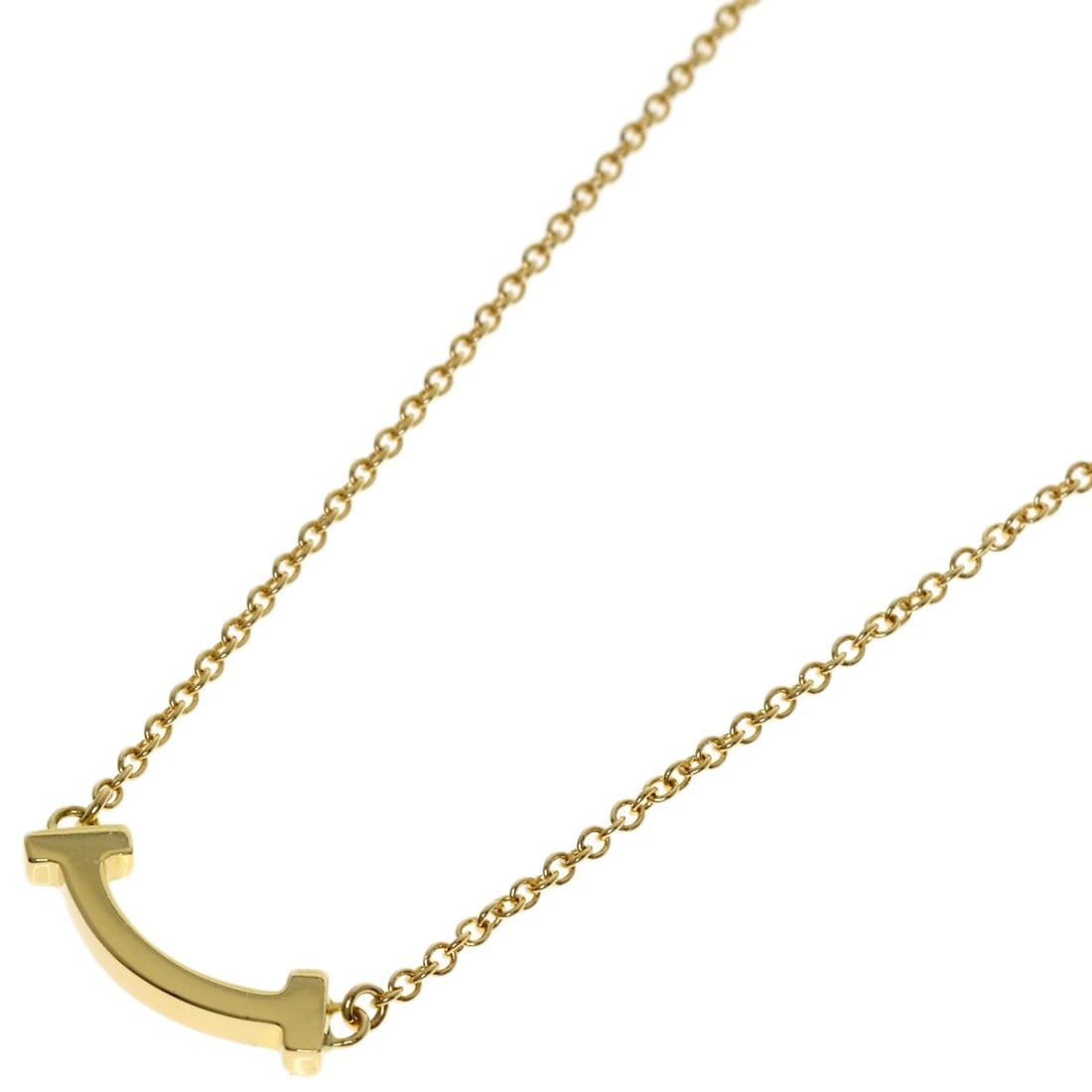 Tiffany&Co T Smile Necklace K18 Yellow Gold: Tiffany&Co T Smile Necklace K18 Yellow Gold K18 Yellow Gold Tiffany&Co T Smile Necklace is a stunning piece featuring a signature from the renowned brand. This 17.7-inch necklace showcases the beauty