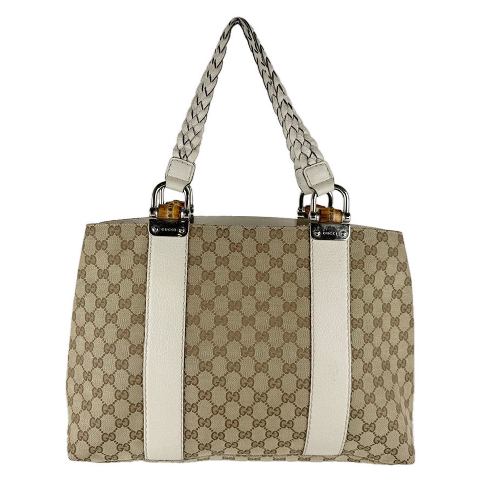 Canvas Leather Gucci Bag Tote: Canvas Leather Gucci Bag Tote Canvas Leather Gucci Bag Tote in Beige Brown, Ivory. This iconic tote features Gucci's signature GG canvas and high-quality leather, combining style and durability. With 
