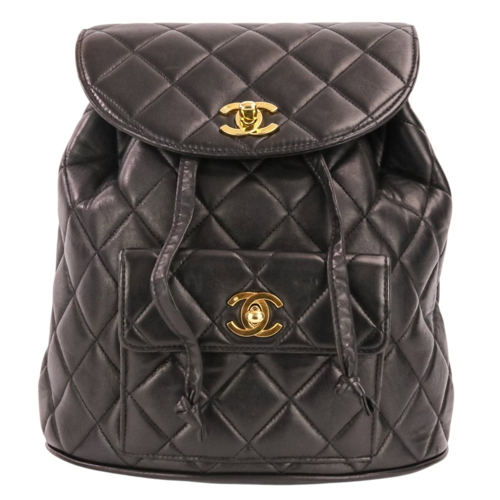 Backpack Leather By Chanel: Backpack Leather By Chanel Black lambskin backpack from Chanel, measuring 25cm x 22cm x 10cm. Made from high-quality leather, this vintage piece is a classic design element. The signature bears a