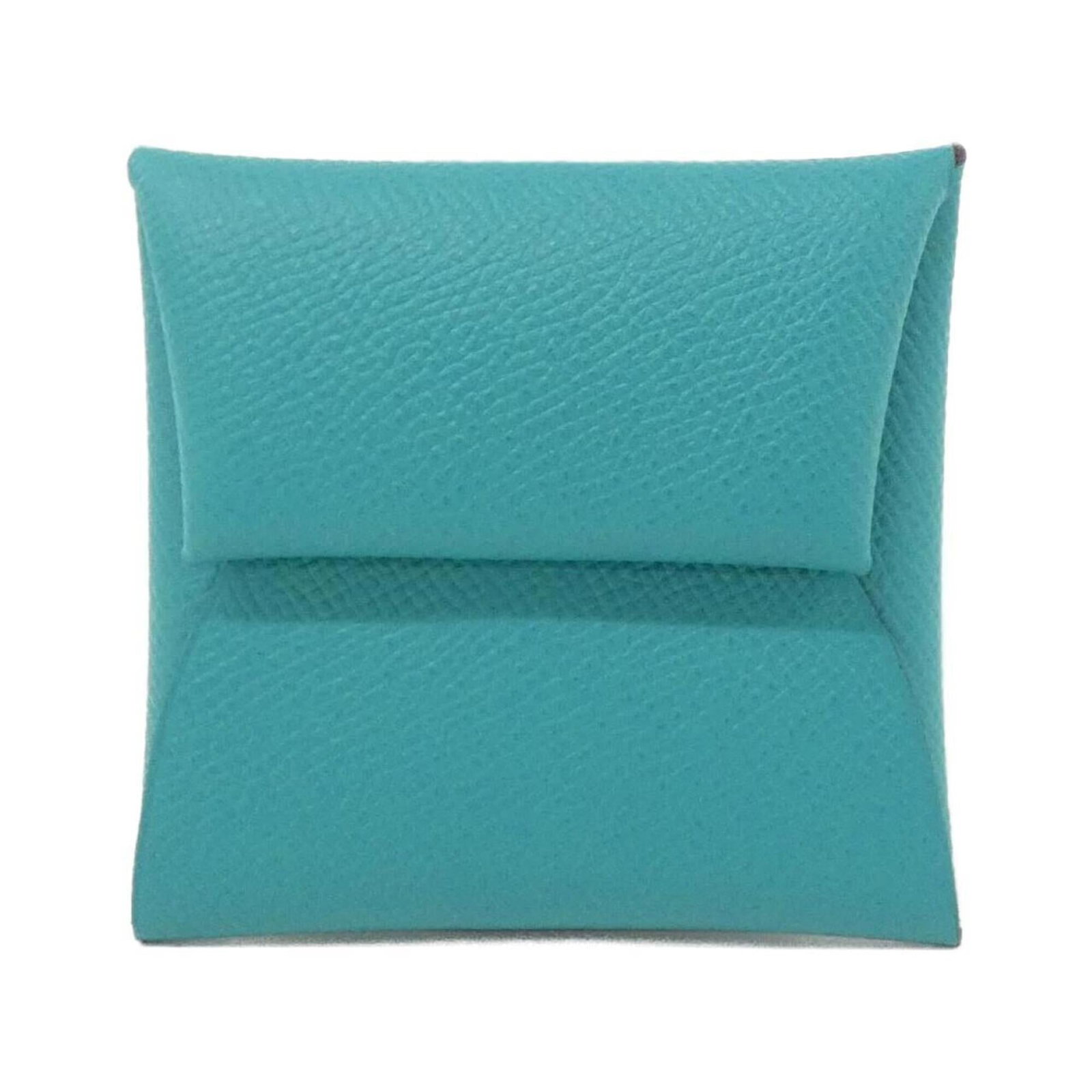 Hermes Coin Purse/ Coin Case Epsom Leather: Hermes Coin Purse/ Coin Case Epsom Leather Epsom leather coin purse/coin case from Hermes, featuring a sleek blue paon color and compact 8cm x 9cm x 1cm dimensions. This stylish accessory is made