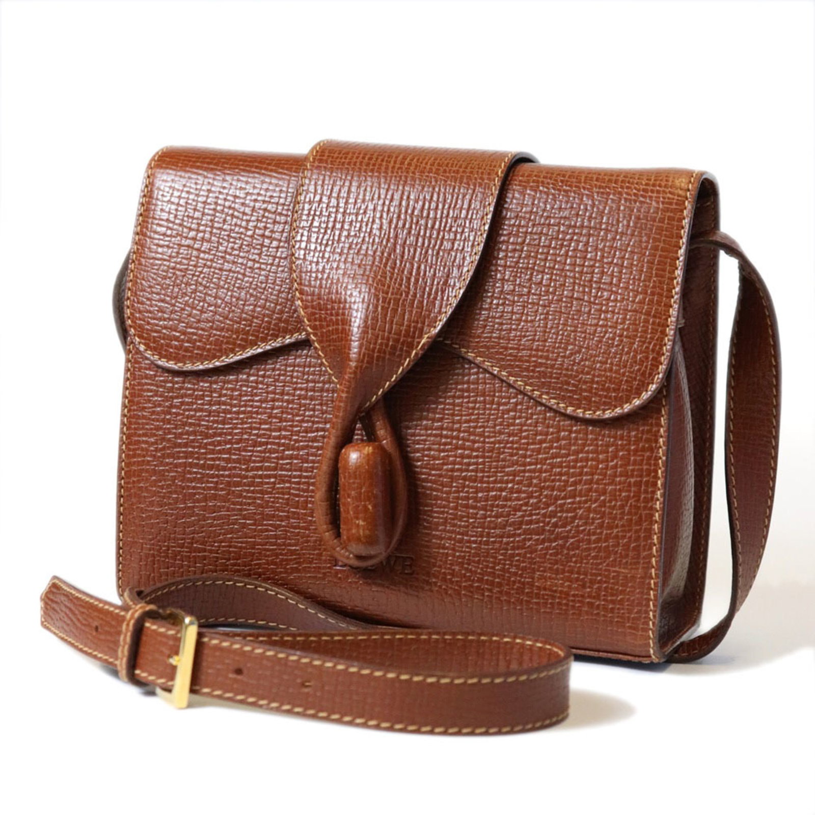Shoulder Bag Leather: Shoulder Bag Leather Brown leather shoulder bag from Loewe, Spain, with dimensions 16cm x 21cm x 8cm. This bag features high-quality leather construction and a classic design. Made in Spain, it bears 