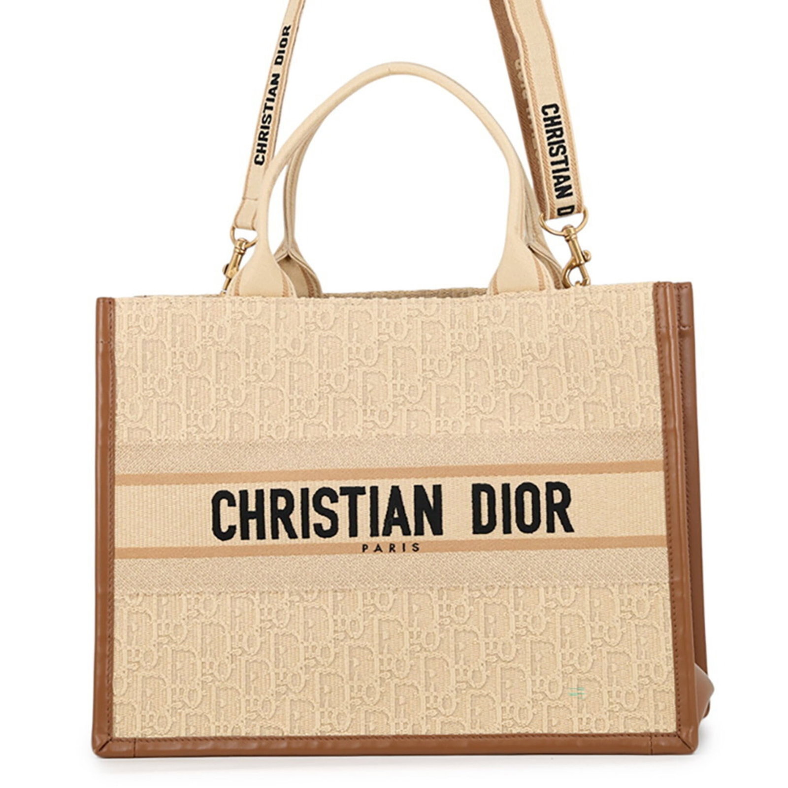 Handbag Canvas Dior Tote Christian: Handbag Canvas Dior Tote Christian Canvas Dior Tote in Beige Brown. This Italian-made canvas tote bag features a classic design with a 27.5cm x 36cm x 16cm size. The beige brown color adds a touch of