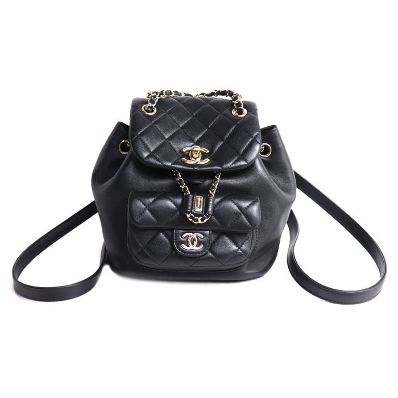 Backpack Leather By Chanel: Backpack Leather By Chanel Leather backpack from iconic French fashion house Chanel, crafted from high-quality lambskin. Measuring 19cm x 18cm x 12cm, this sleek and stylish accessory is made from
