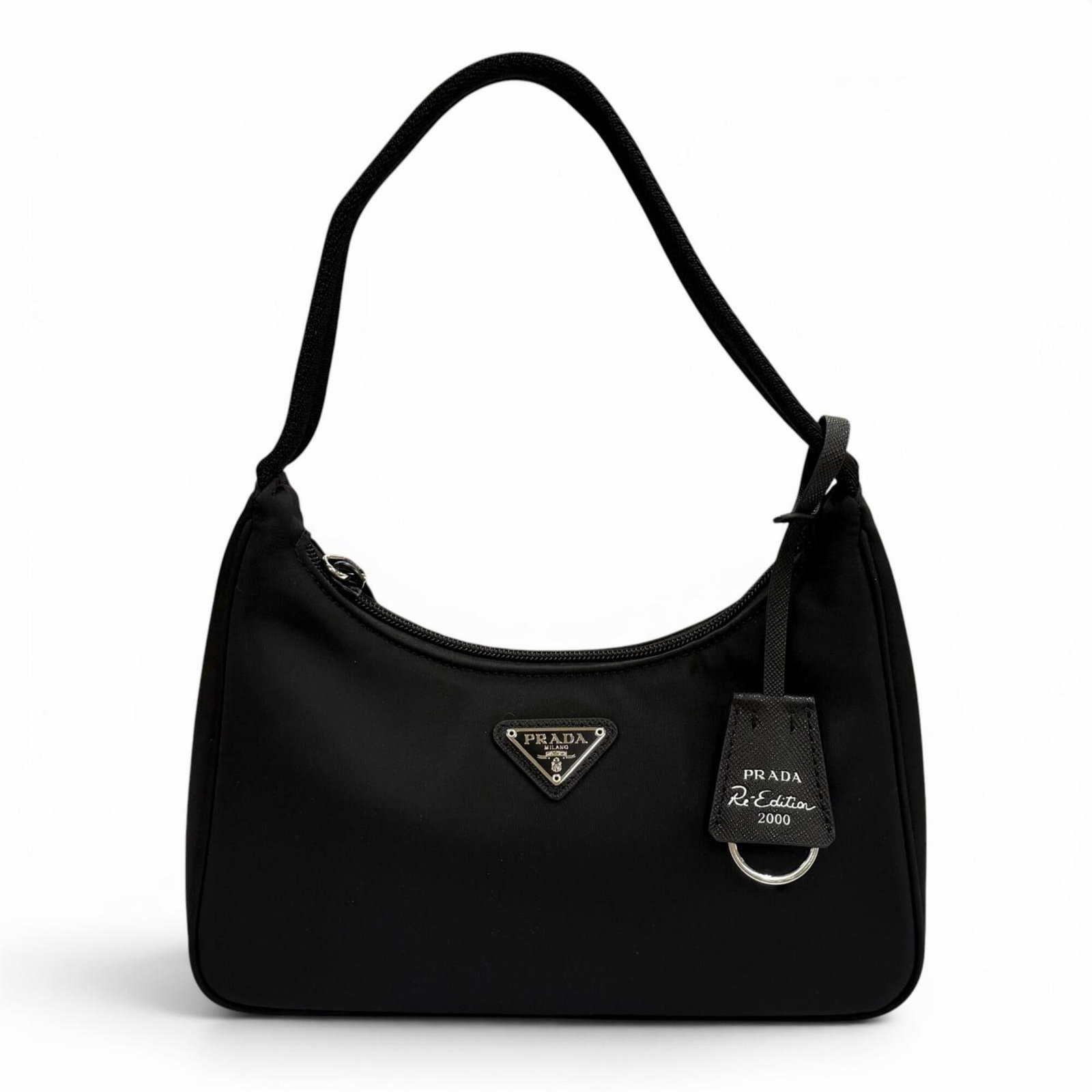 Shoulder Bag Nylon: Shoulder Bag Nylon Prada Country of Origin: Italy, Material: Nylon, Color: Brown, Size: 12cm x 24cm x 6cm. This Prada Country shoulder bag is made from durable nylon and features a classic design.