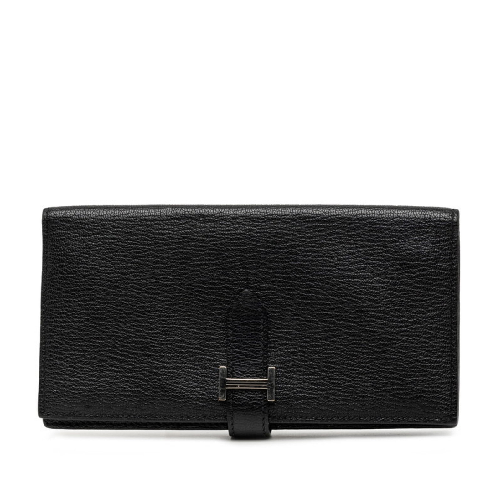 Chevre Leather Bi Fold Hermes Wallet: Chevre Leather Bi Fold Hermes Wallet Chevre leather adds a rich, earthy tone to this bi-fold wallet, while its compact size makes it easy to carry. The Noir color provides a sleek, sophisticated look
