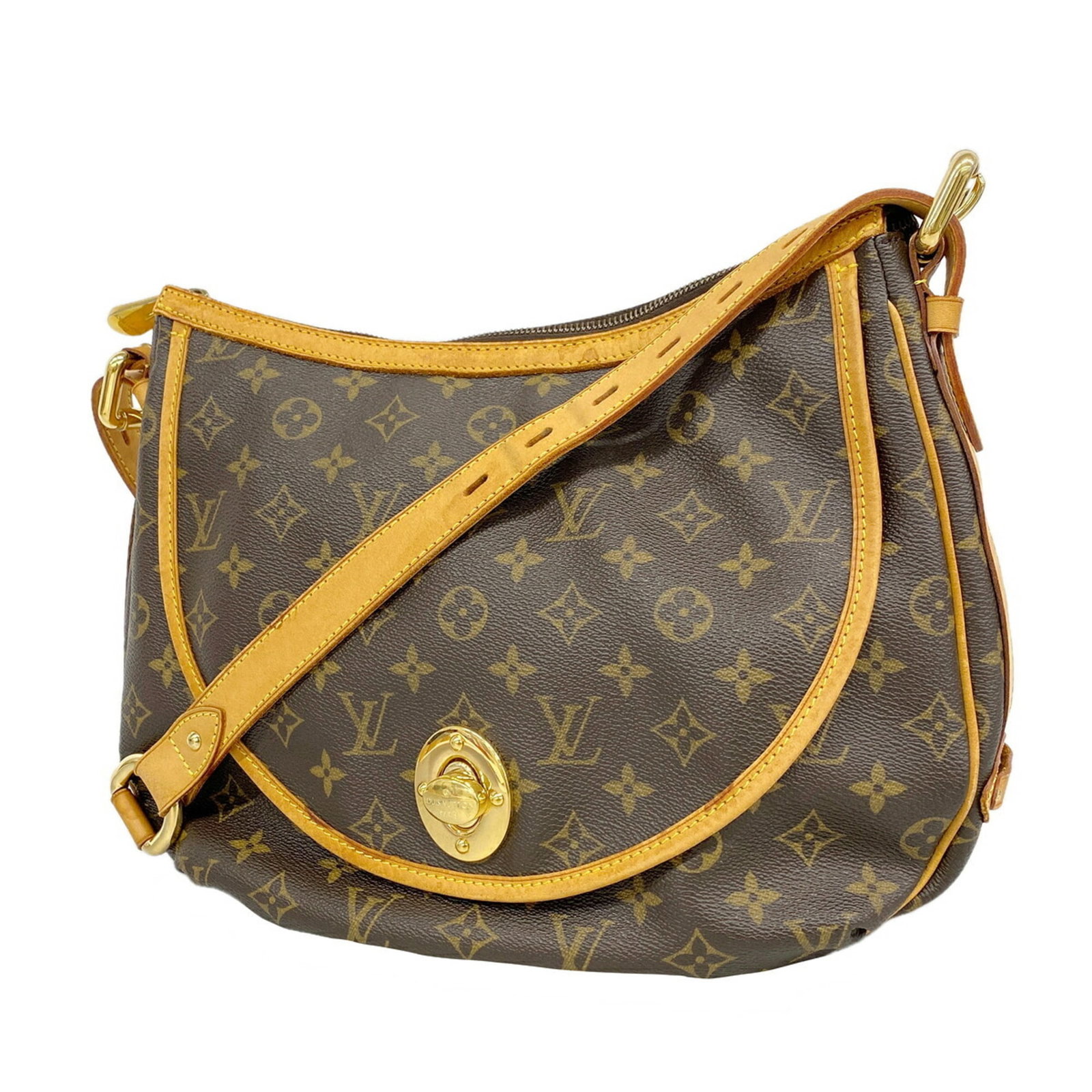 Shoulder Bag by Louis Vuitton: Shoulder Bag by Louis Vuitton Brown Louis Vuitton shoulder bag with classic design and signature monogram pattern. Measuring 29cm x 34cm x 8cm, this stylish bag is perfect for everyday use. Made with
