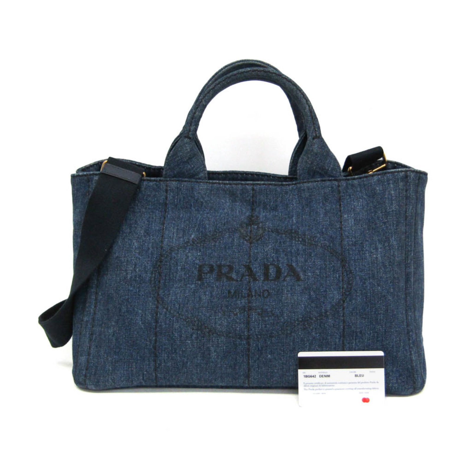 Prada Handbag Shoulder Bag Denim: Prada Handbag Shoulder Bag Denim Denim Prada shoulder bag with open pockets and a zipper pocket, measuring 22cm x 35cm x 24cm, features a signature and is made from high-quality denim material. The