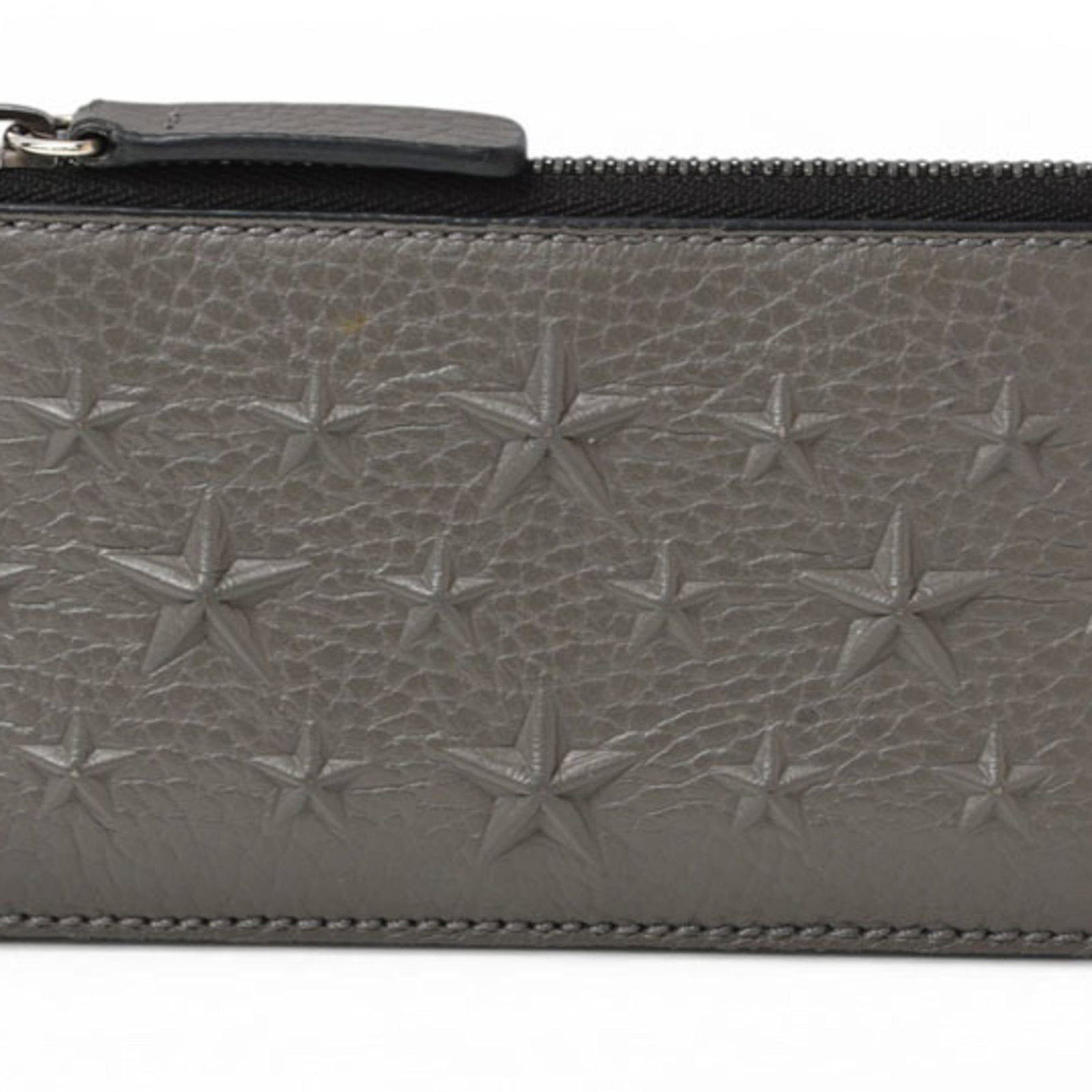 Jimmy Choo Case Leather Card: Jimmy Choo Case Leather Card The Jimmy Choo Case Leather Card is a sleek, gray leather card case with a compact size that fits perfectly in a pocket or purse. Made from high-quality leather, this card