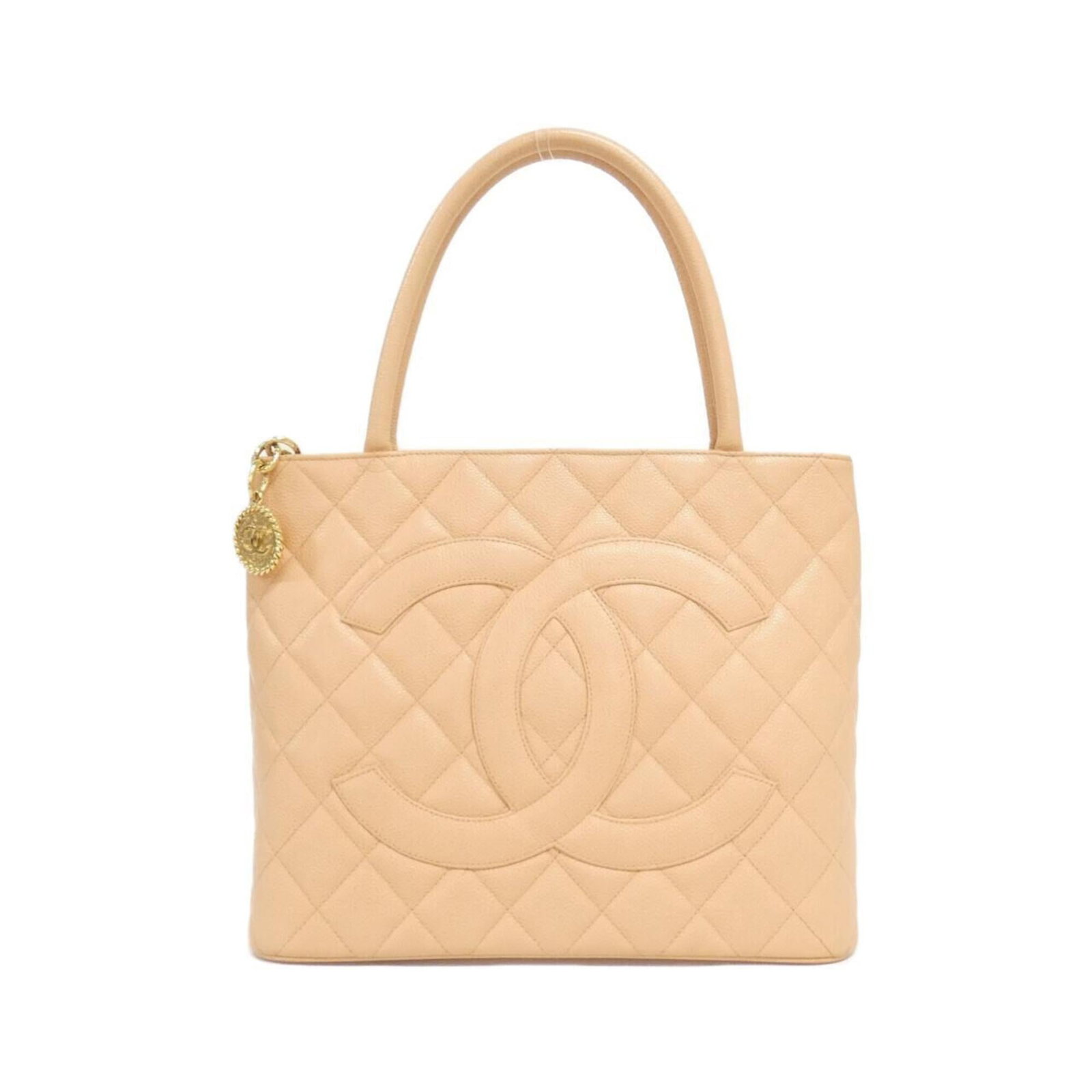 Calfskin Handbag Chanel: Calfskin Handbag Chanel Calfskin Handbag Chanel bears a signature. Made from grained calfskin, this handbag features a distinctive orange, salmon pink color. Its compact size, measuring 25cm x 30cm x 