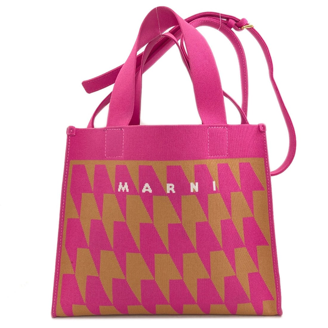 Canvas Marni Handbag 2Way: Canvas Marni Handbag 2Way Pink Canvas Marni Handbag 2Way. This handbag features a canvas exterior in a vibrant pink color, making a statement with its bold and eye-catching design. The 2Way style
