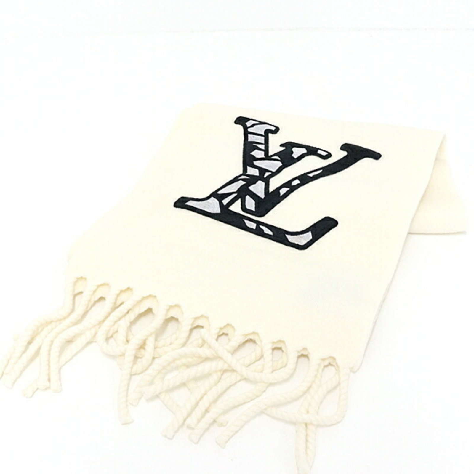 Louis Vuitton Stole Wool: Louis Vuitton Stole Wool Louis Vuitton Stole Wool is a stunning piece made from high-quality wool, measuring 2.31m x 28cm in size. The stole bears a signature, and comes with a luxurious box for