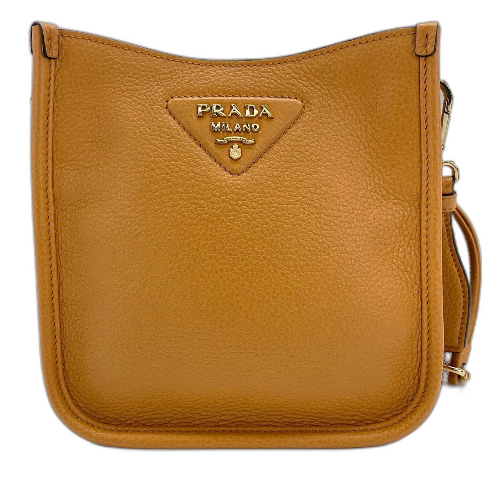 Shoulder Bag Leather Prada: Shoulder Bag Leather Prada The Prada shoulder bag is a classic design made from high-quality leather, featuring a timeless brown color. Measuring 18cm x 18cm x 5cm, this compact bag is perfect for eve