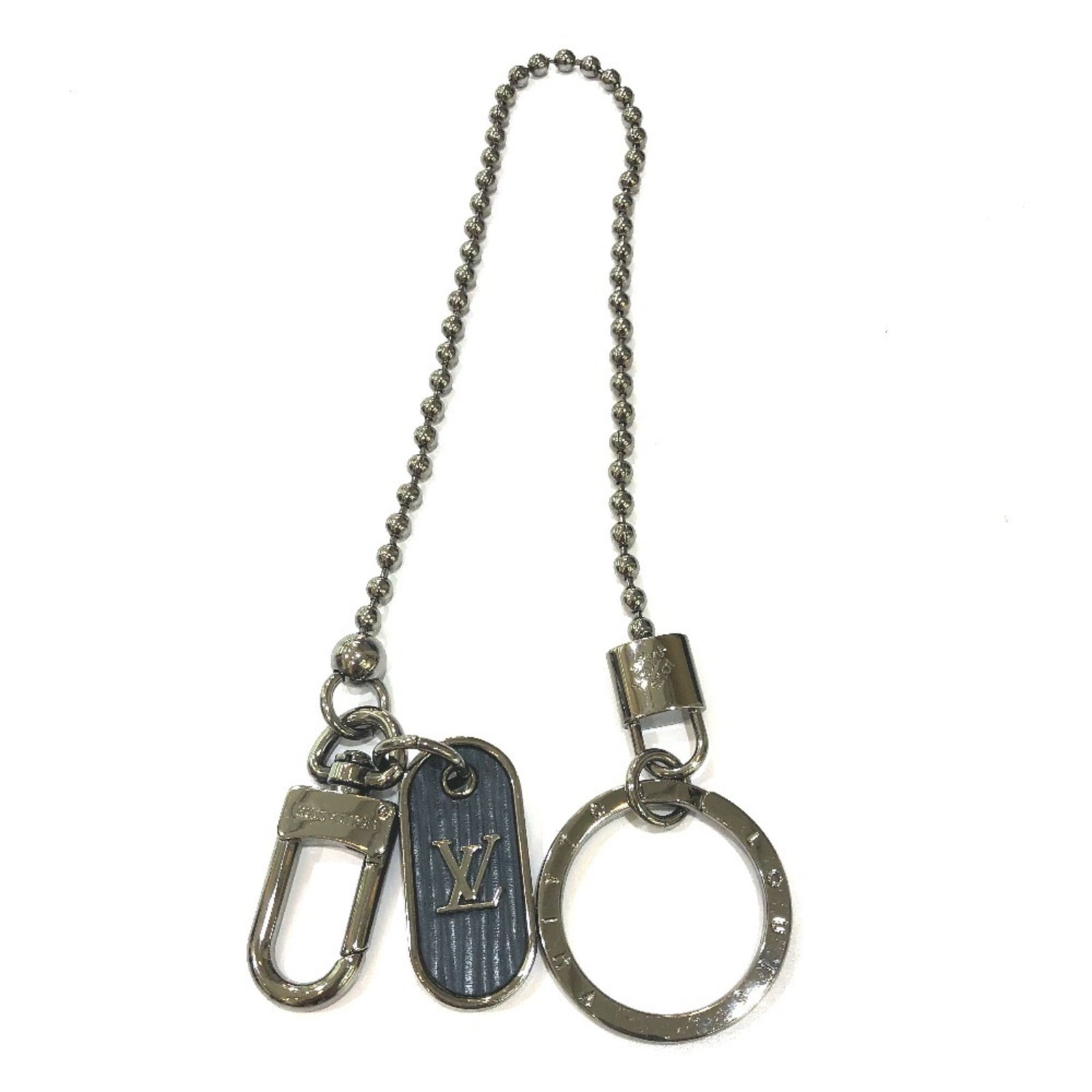 Key Chain Metal Louis Vuitton: Key Chain Metal Louis Vuitton Silver Metal Louis Vuitton Key Chain comes with a box and dust bag. The key chain is made of metal and features the Louis Vuitton brand. It bears a signature. Item