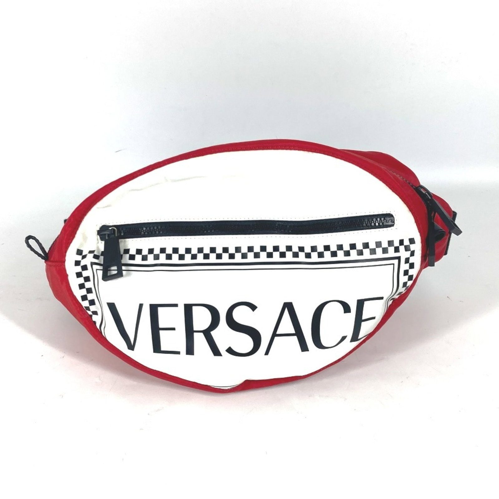 Nylon Versace Sling Bag Shoulder Bag: Nylon Versace Sling Bag Shoulder Bag Red Versace Nylon Sling Bag. Made from nylon, this sling bag features a striking red color and measures 18.5cm x 26.5cm. The bag's design is defined by its